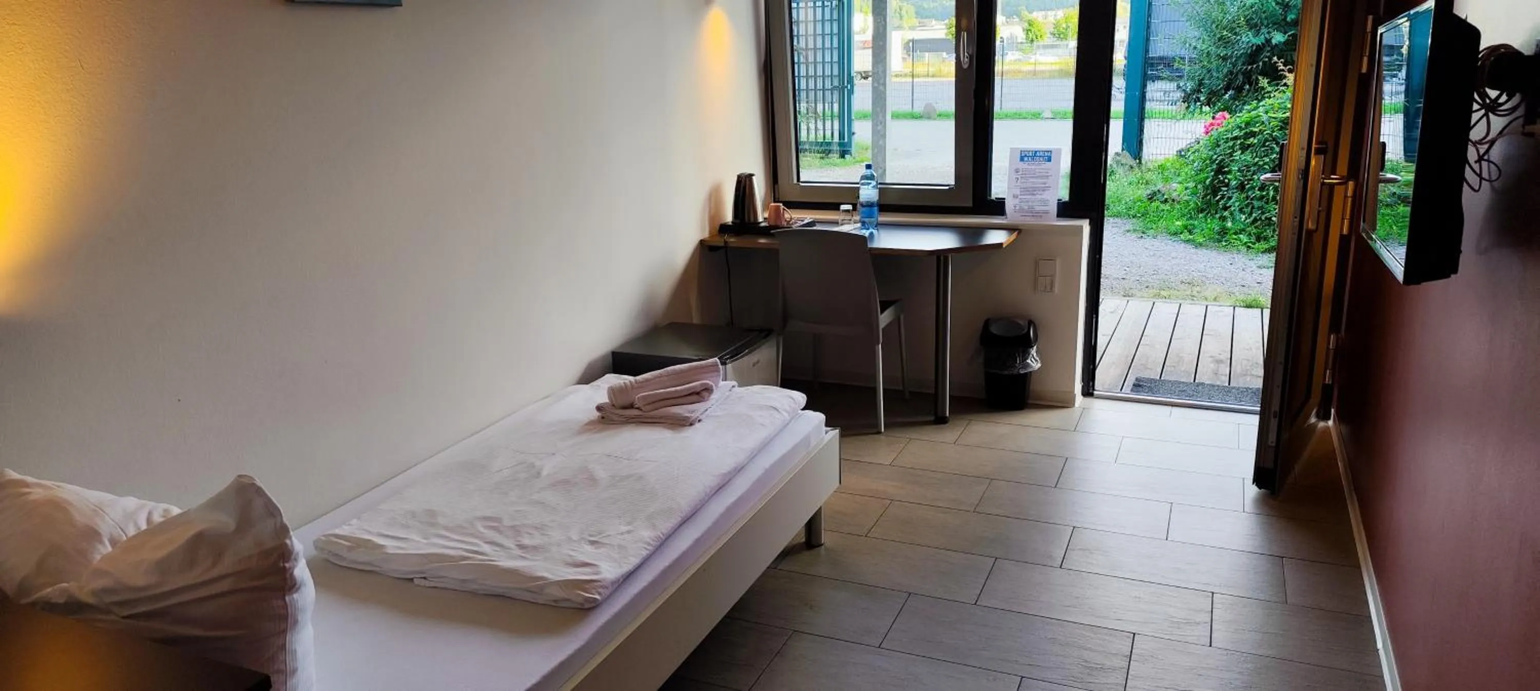 Photo of the whole room, Bed in Arena Hotel Waldshut