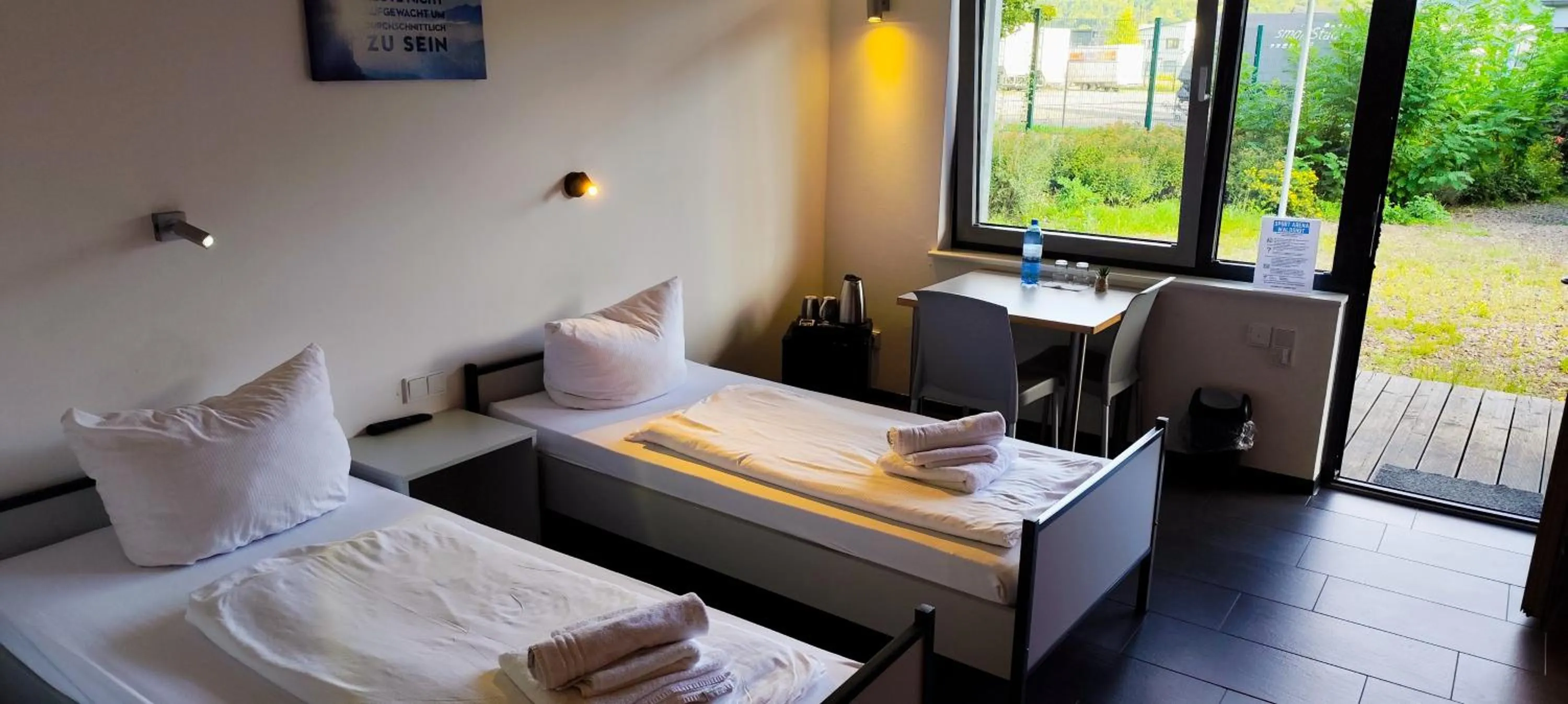 Photo of the whole room, Bed in Arena Hotel Waldshut