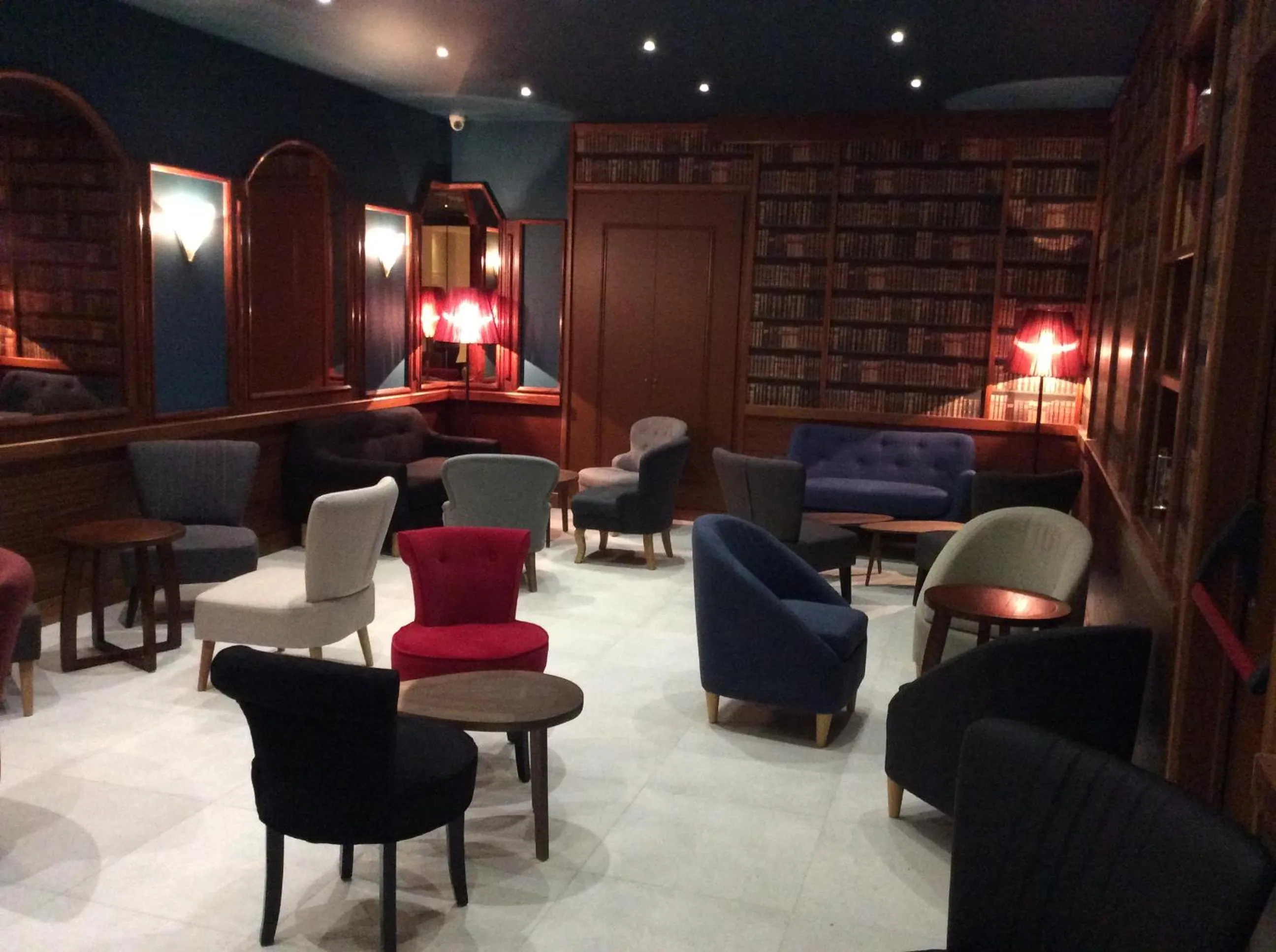 Communal lounge/ TV room in Hotel La Regence