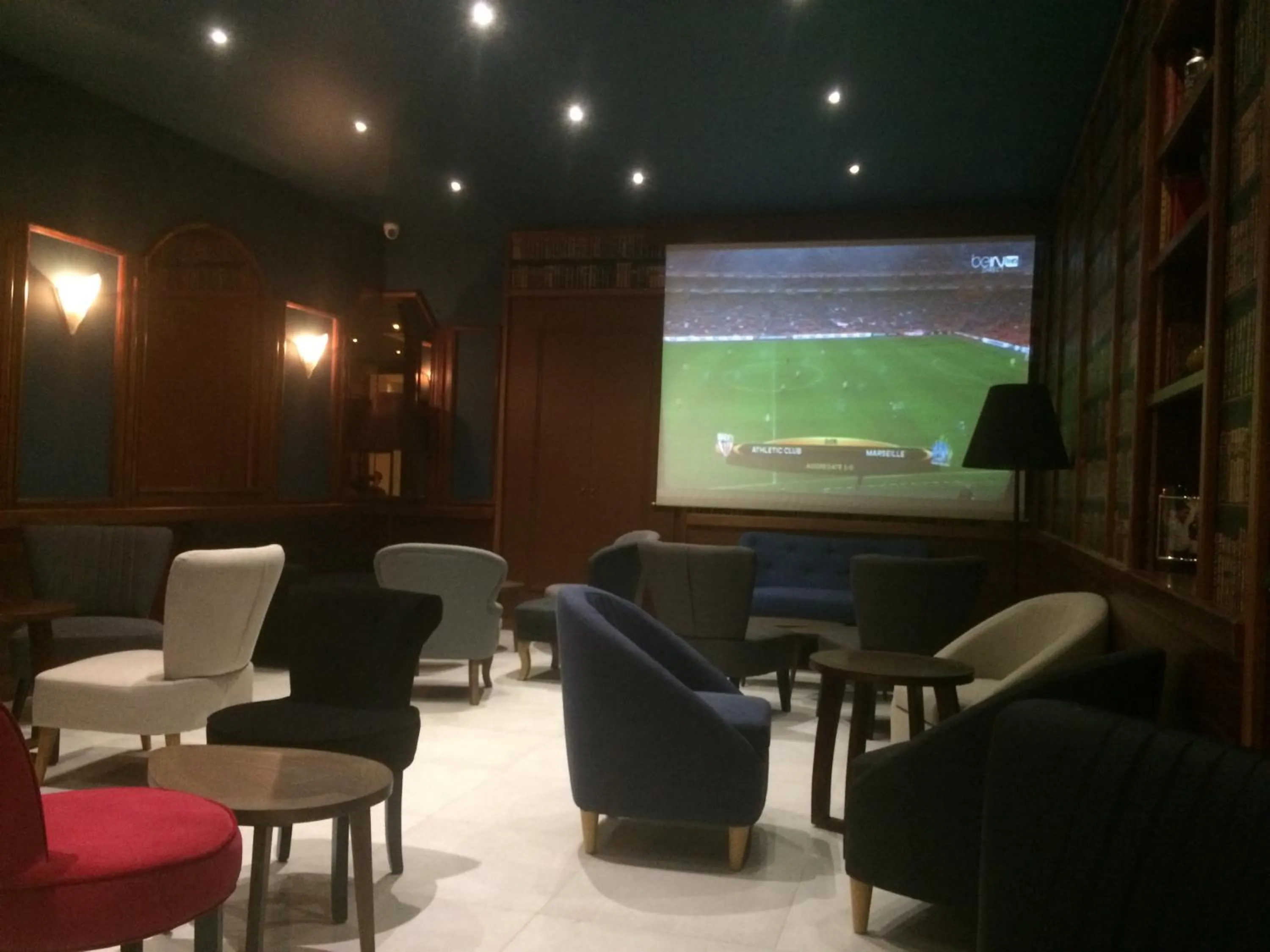 Communal lounge/ TV room in Hotel La Regence