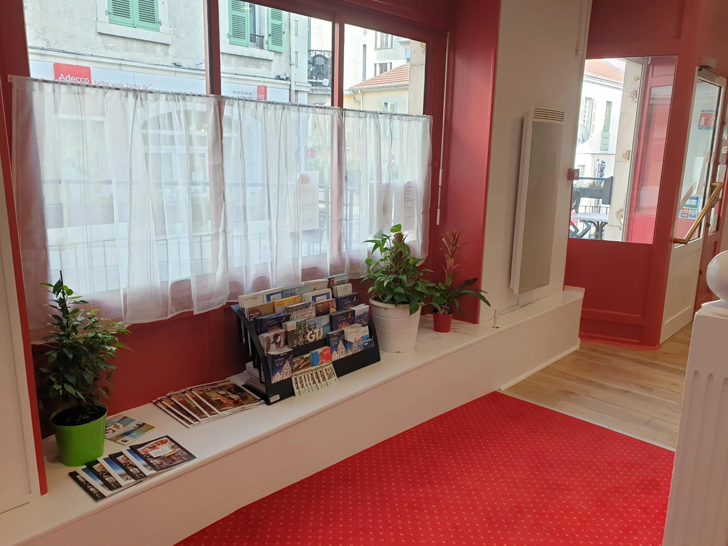 Lobby or reception in Hôtel Hermance