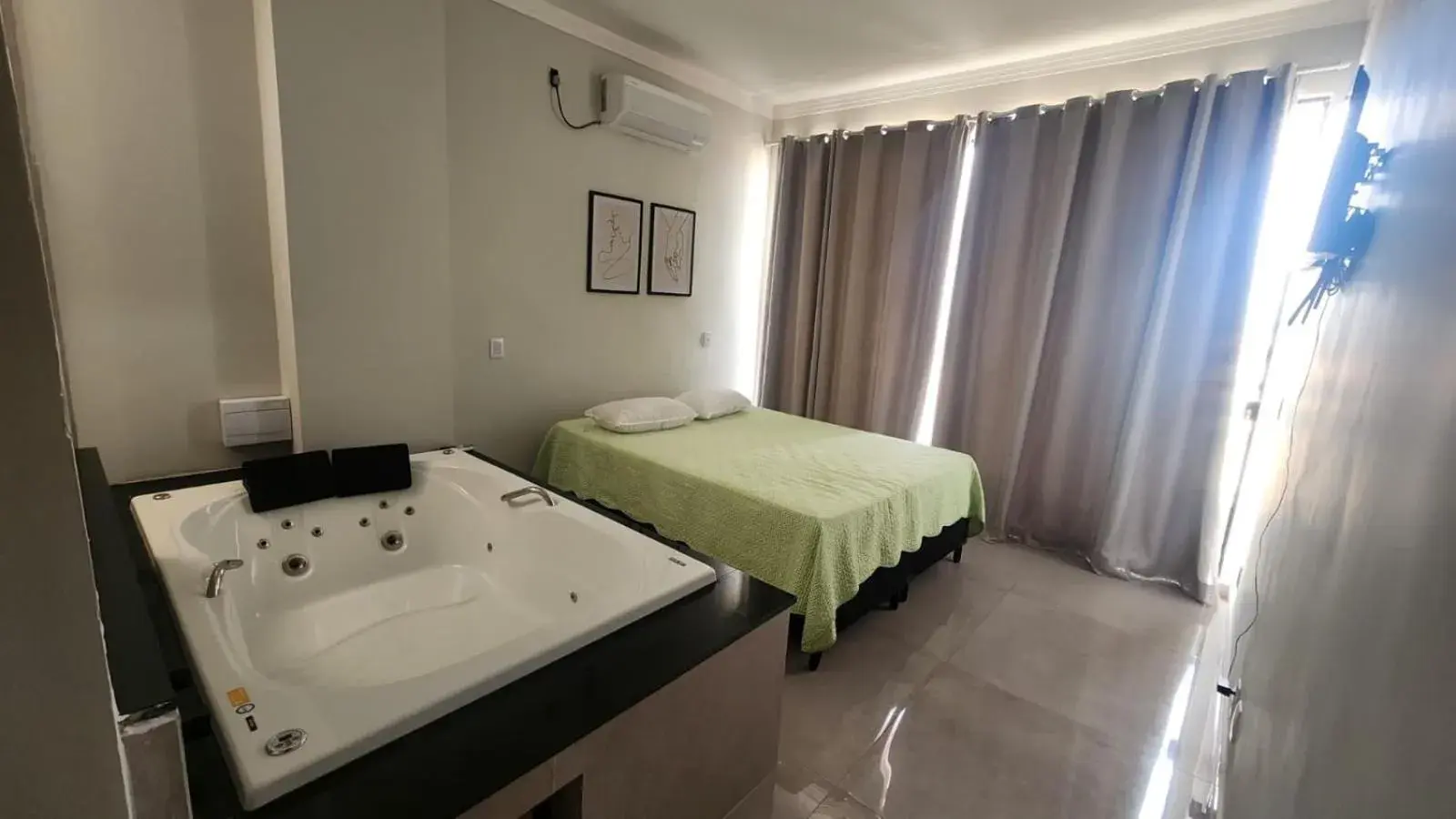 Queen Suite with Spa Bath in Vila Caluca Olimpia - Flats & Suites Queen Suite with Spa Bath in Vila Caluca Olimpia - Flats & Suites