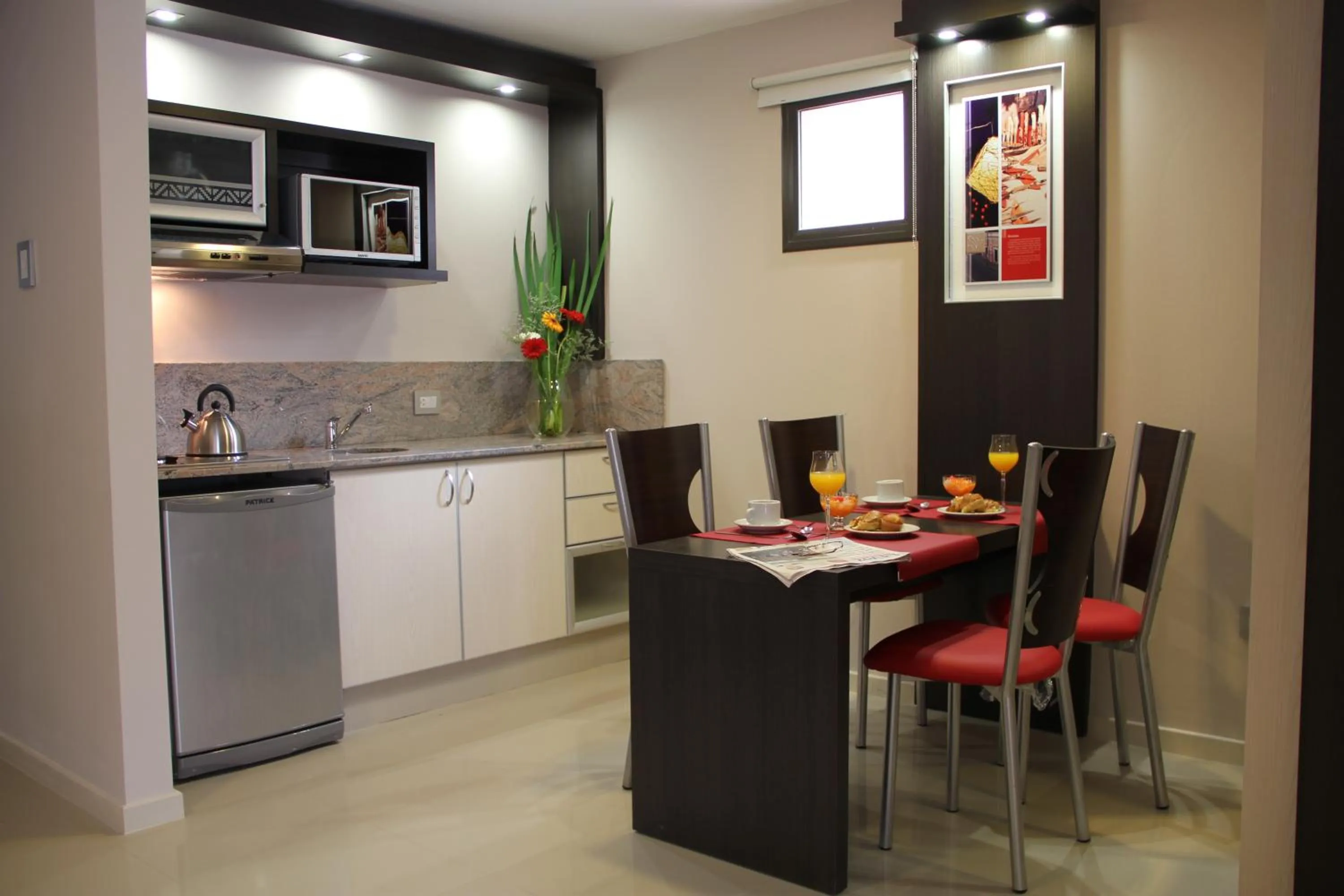 Kitchen or kitchenette in Sol de Piedra Apart, Suites & Spa