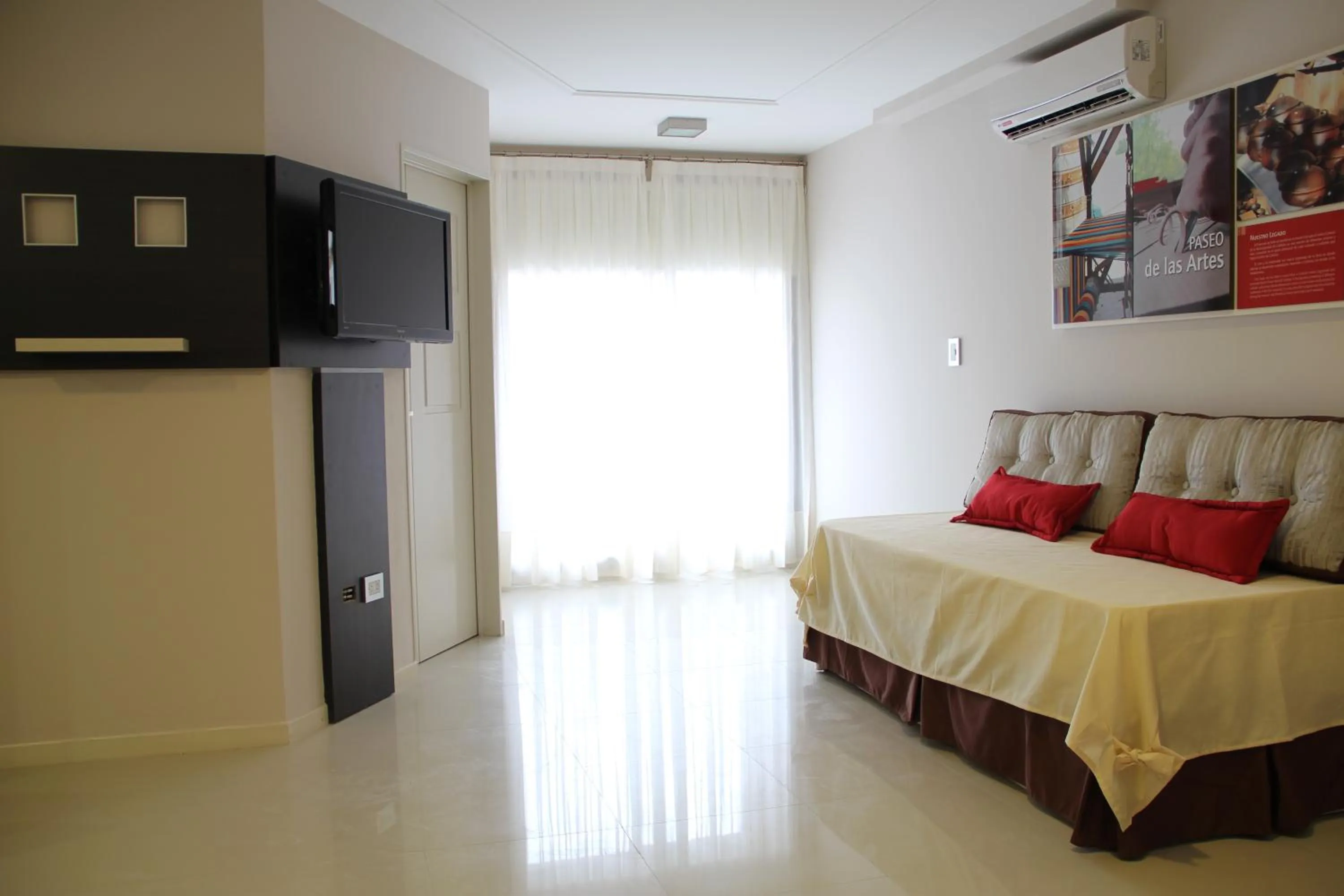TV and multimedia, Bed in Sol de Piedra Apart, Suites & Spa