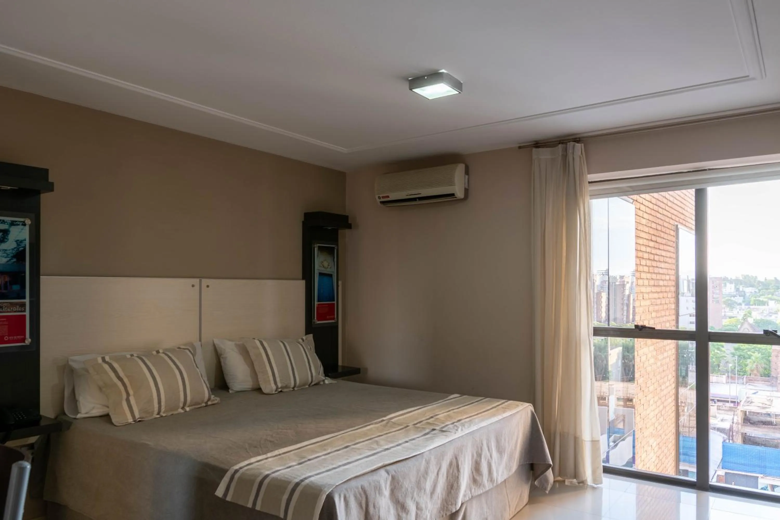 Bed in Sol de Piedra Apart, Suites & Spa