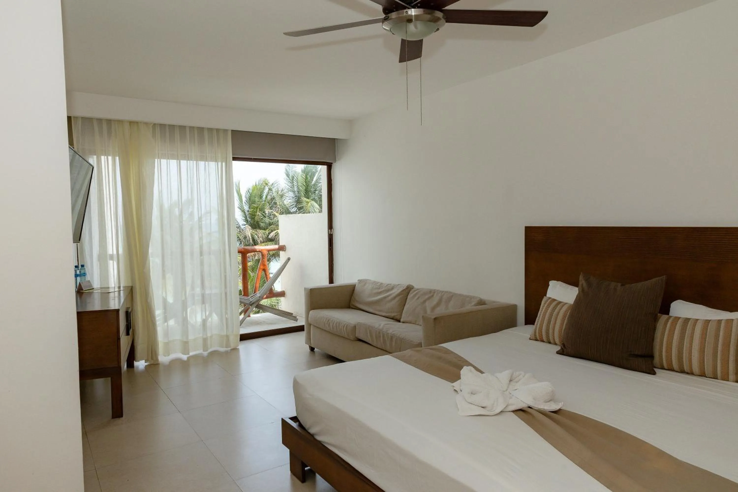 Bed in Quinto Sole Boutique Hotel Mahahual