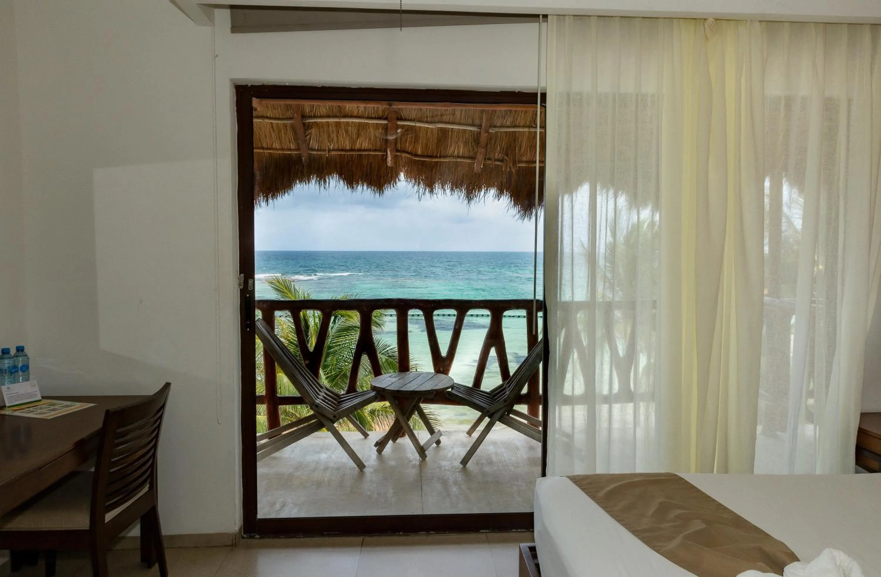 Photo of the whole room, Bed in Quinto Sole Boutique Hotel Mahahual