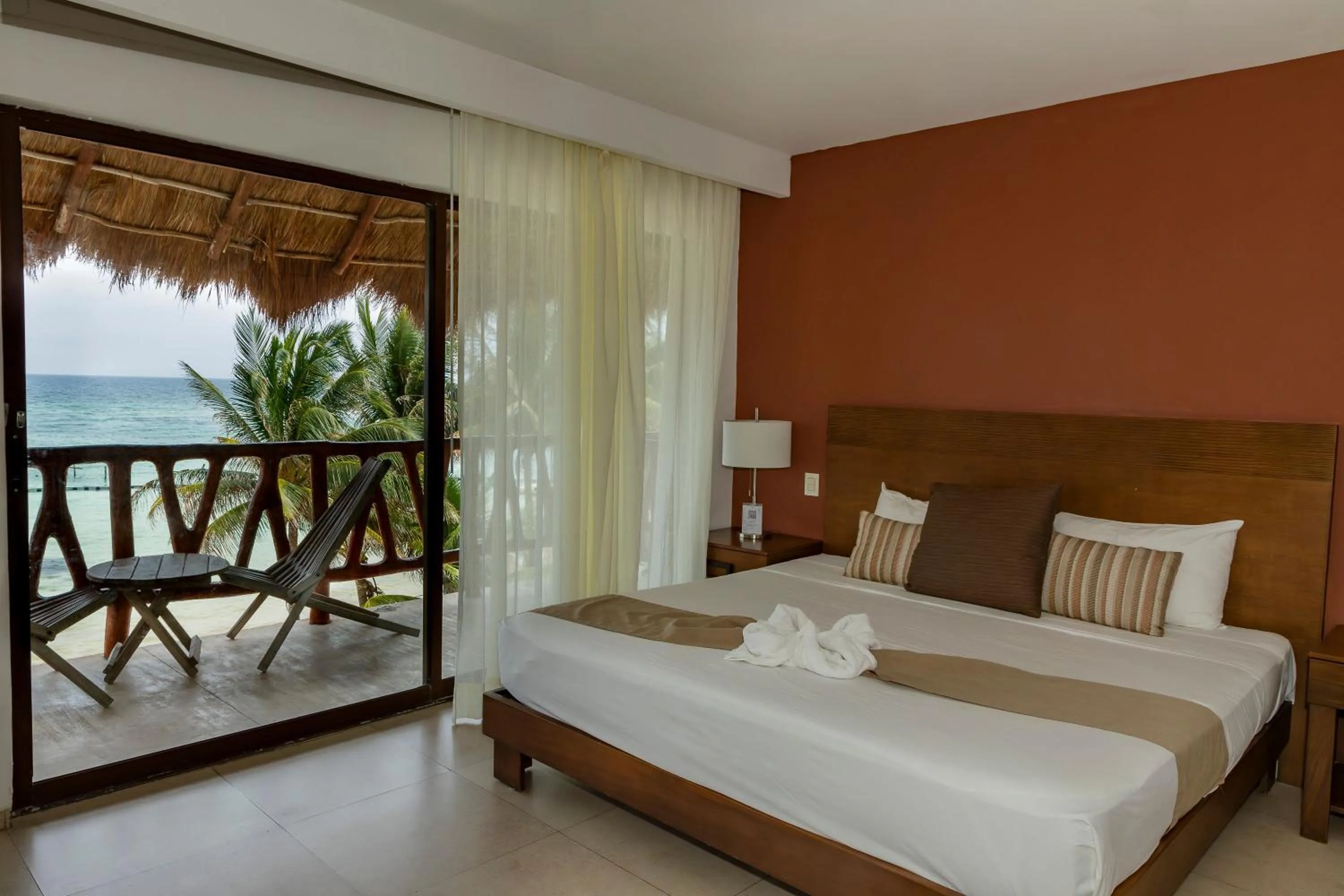 Bed in Quinto Sole Boutique Hotel Mahahual