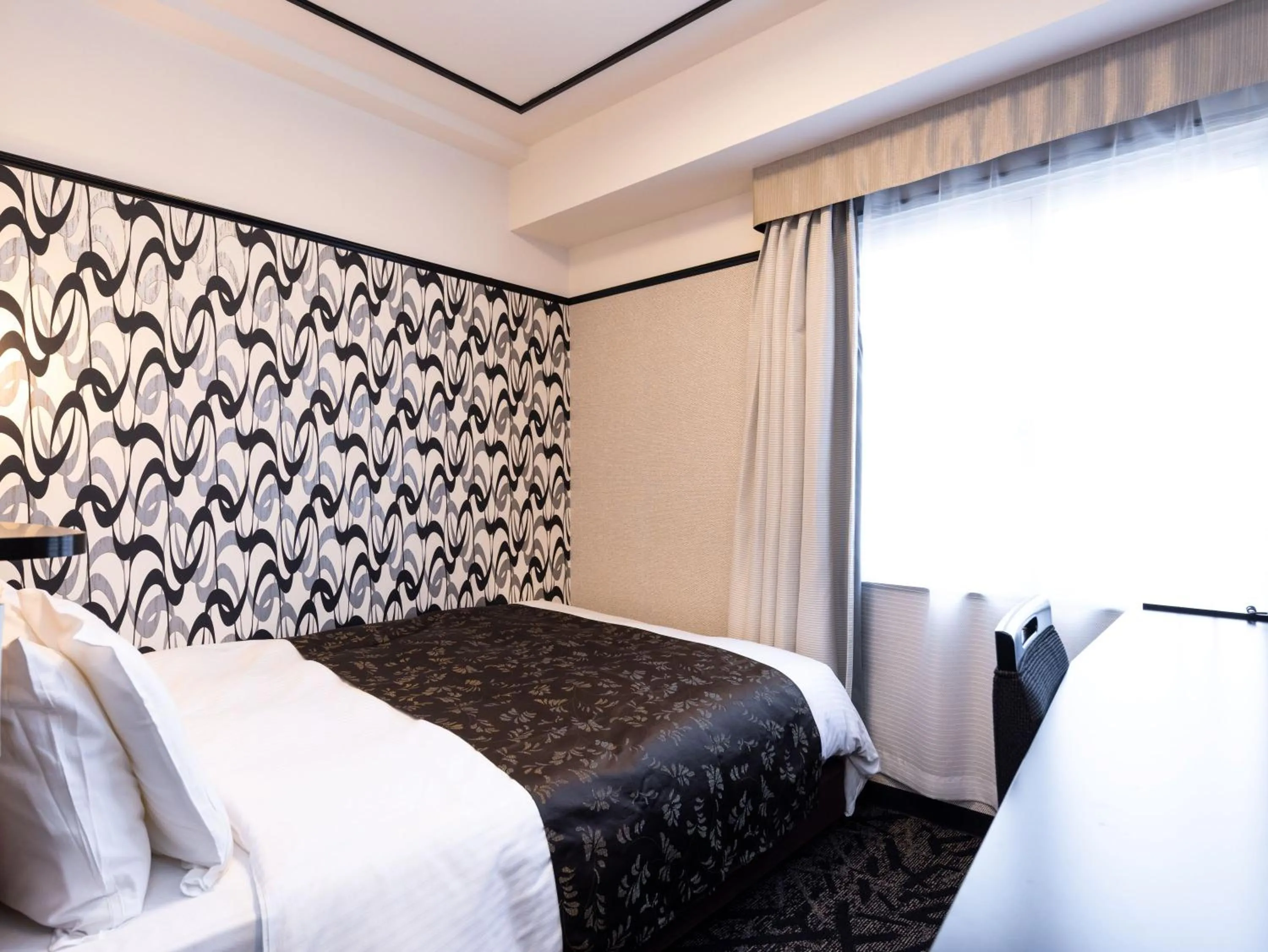 Photo of the whole room, Bed in APA Hotel Fukui Katamachi