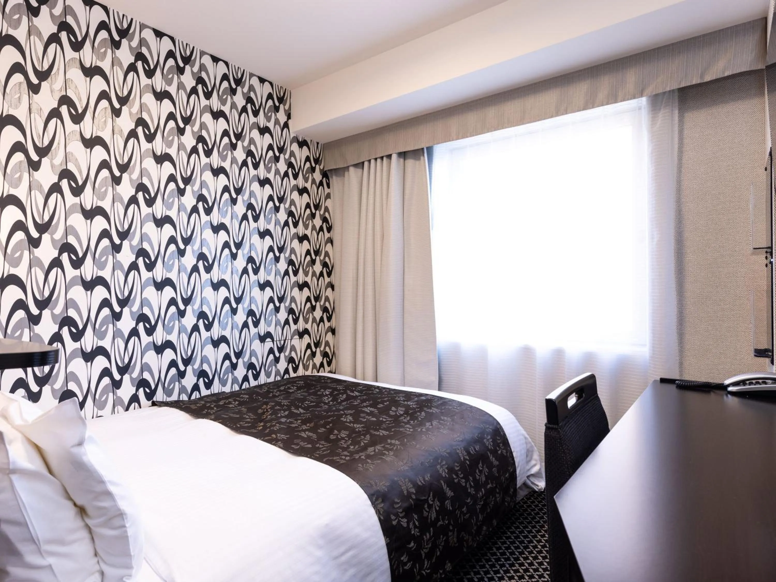 Photo of the whole room, Bed in APA Hotel Fukui Katamachi