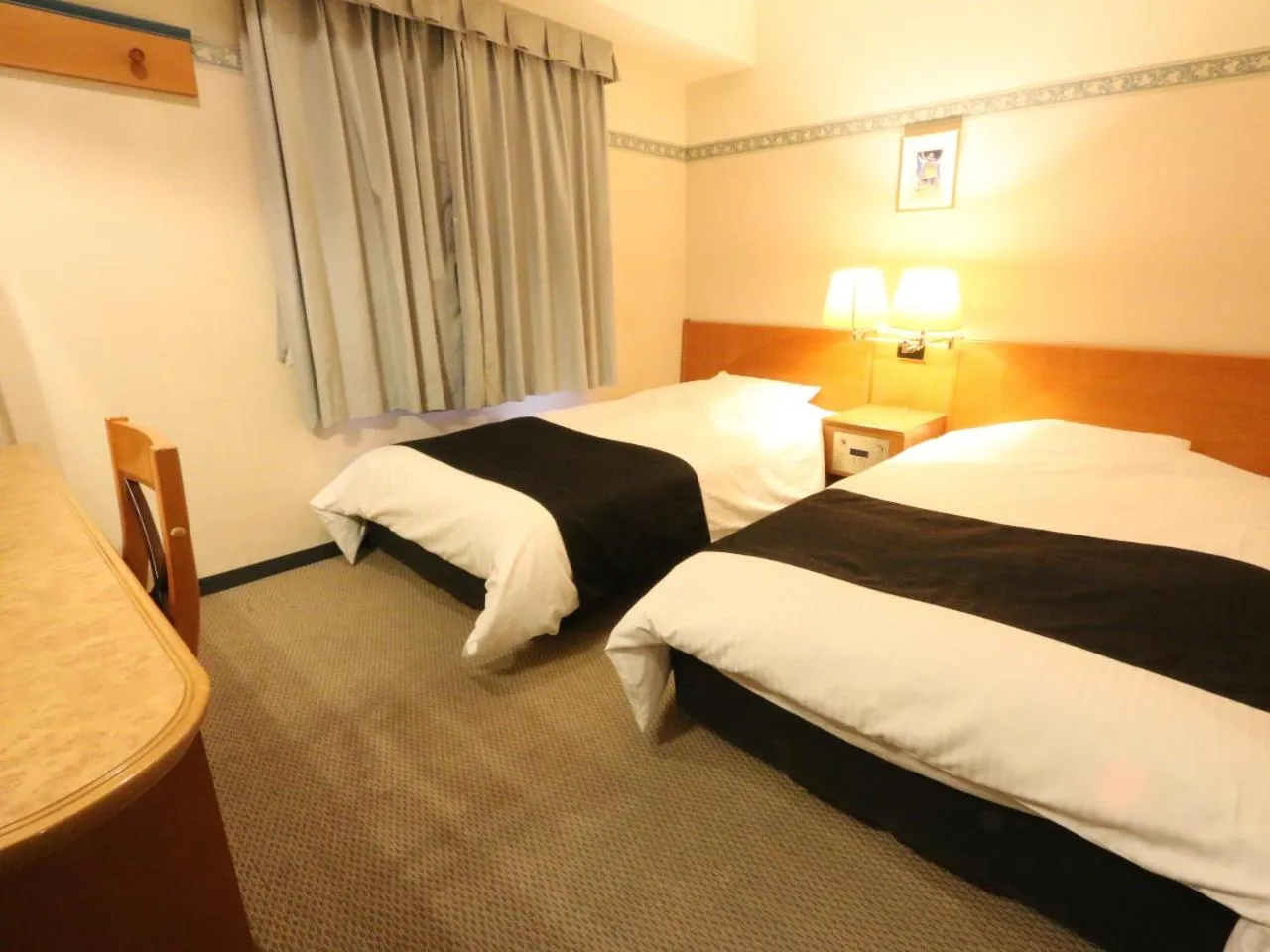 Photo of the whole room, Bed in APA Hotel Fukui Katamachi