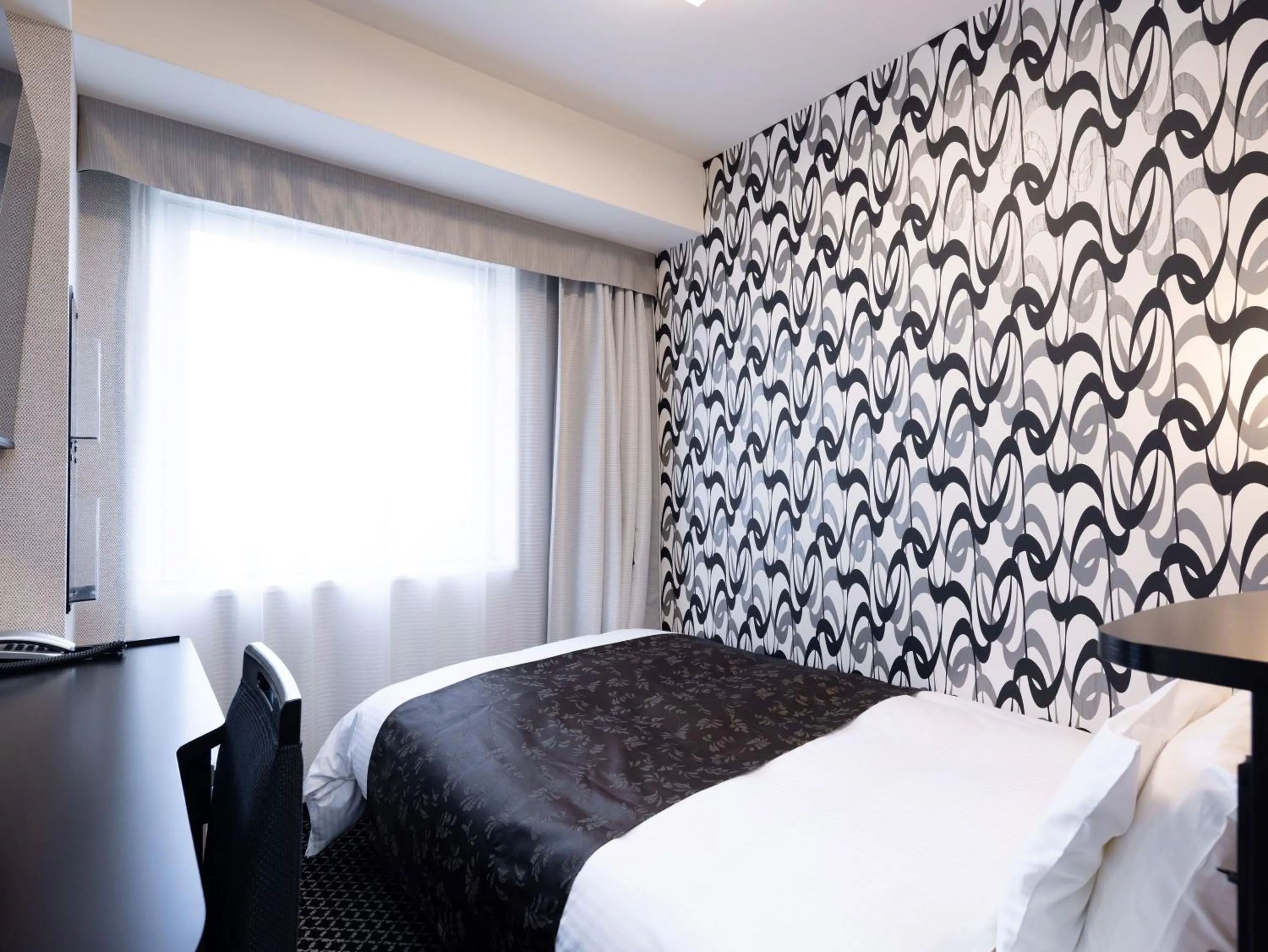 Photo of the whole room, Bed in APA Hotel Fukui Katamachi