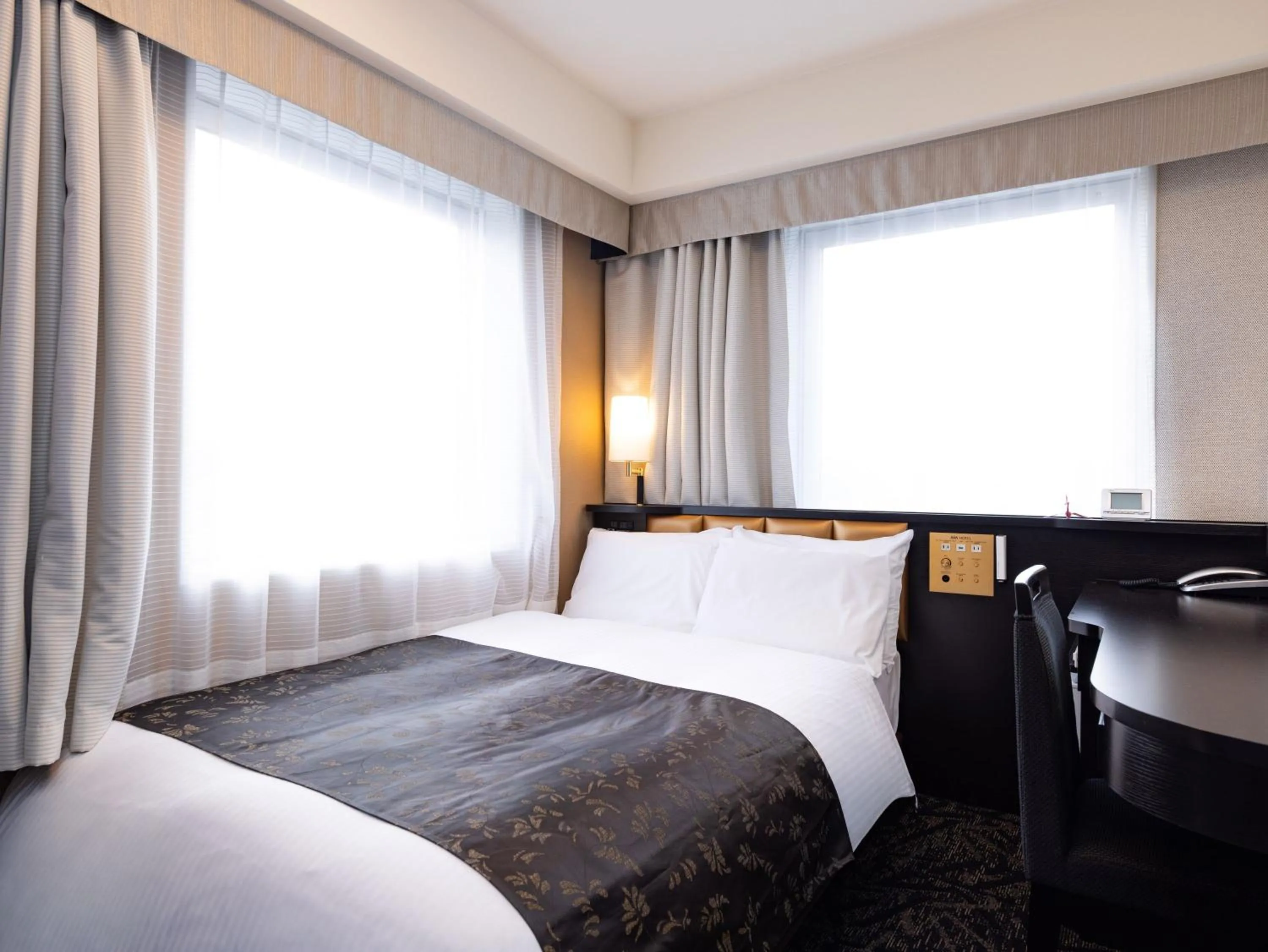 Photo of the whole room, Bed in APA Hotel Fukui Katamachi