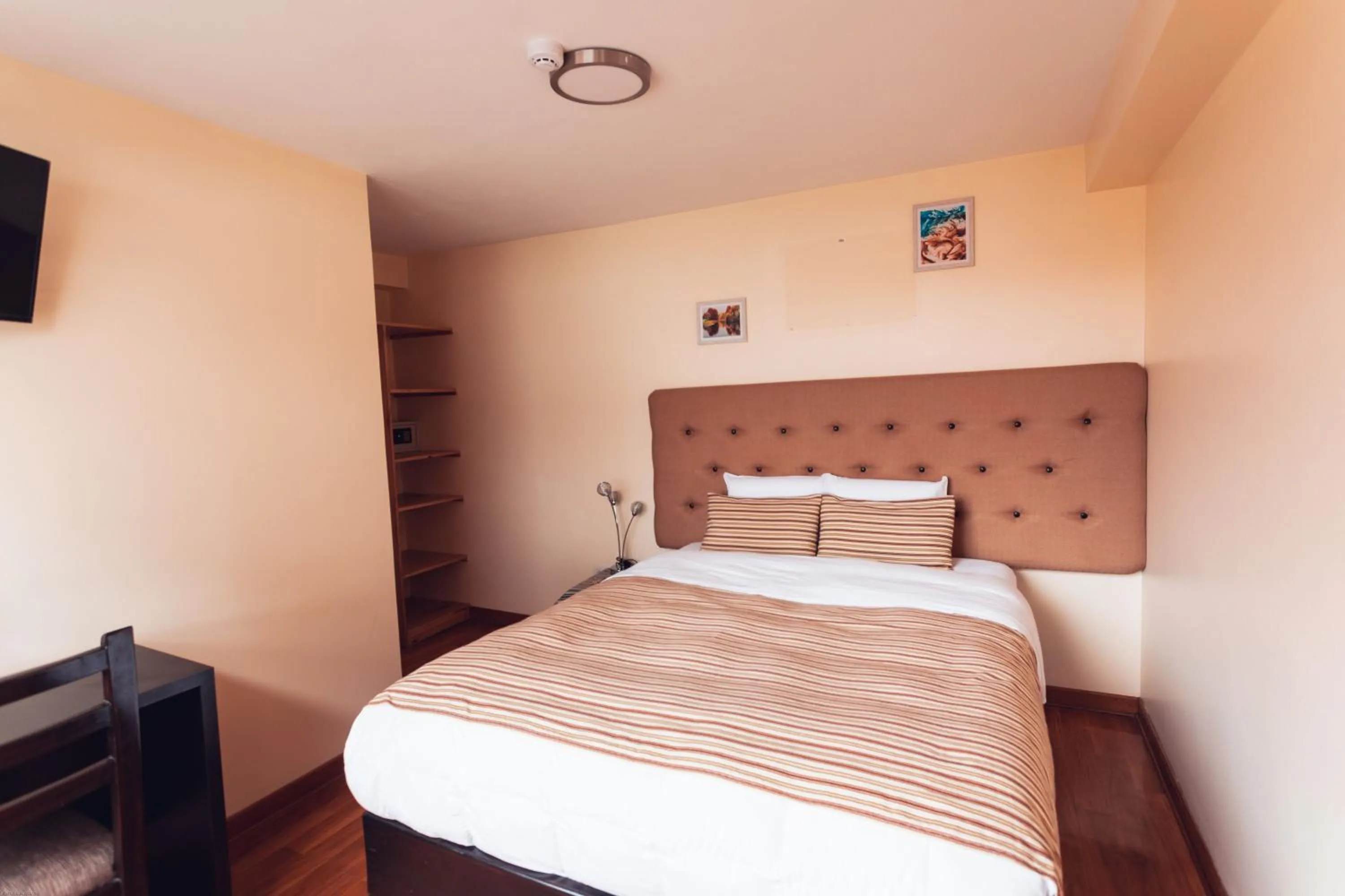 Bed in Hotel Las Quenas