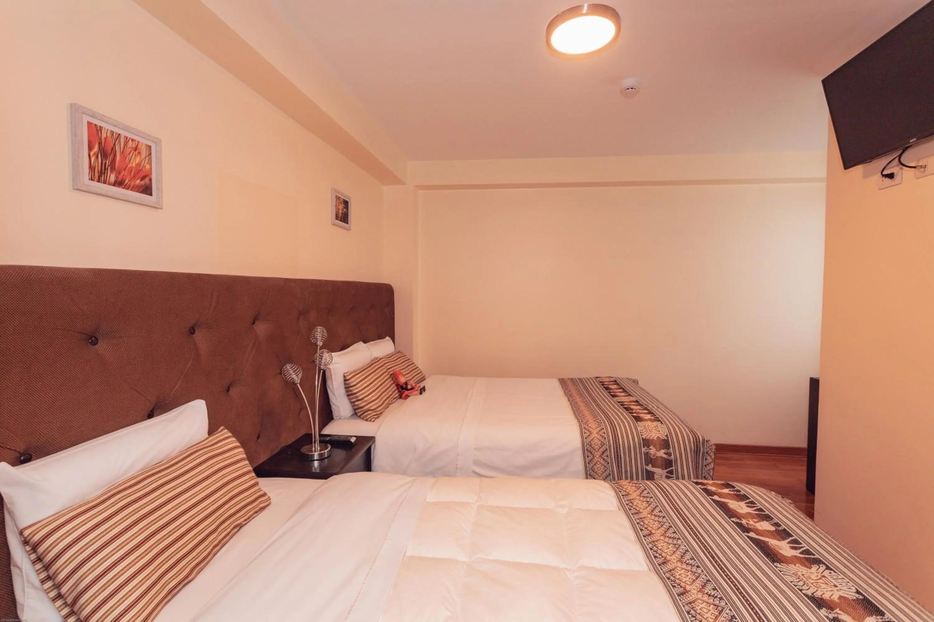 Bed in Hotel Las Quenas