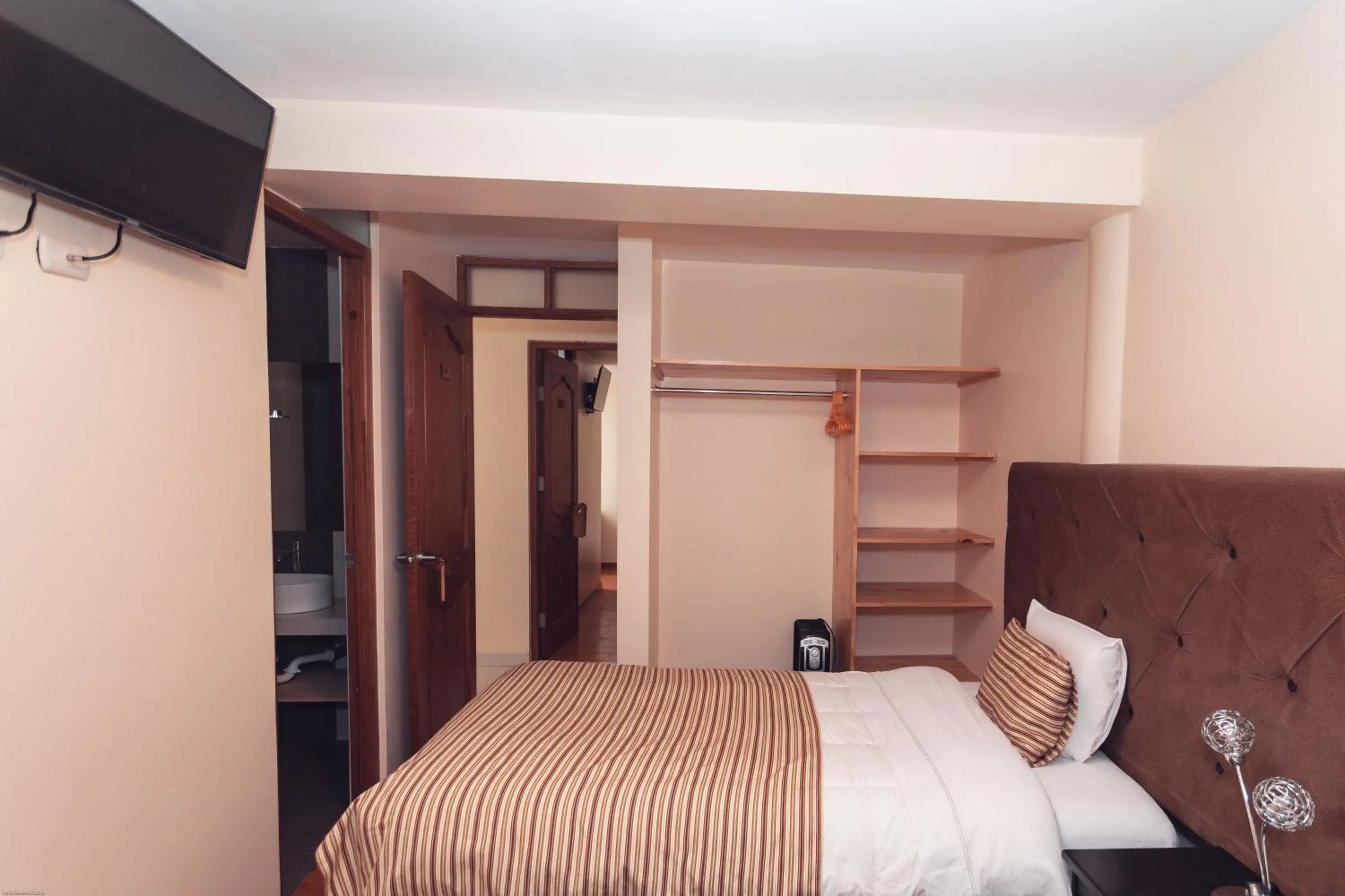 Bed in Hotel Las Quenas