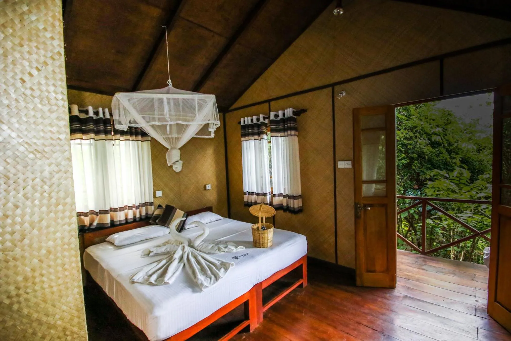 Photo of the whole room, Bed in The Thick Forest