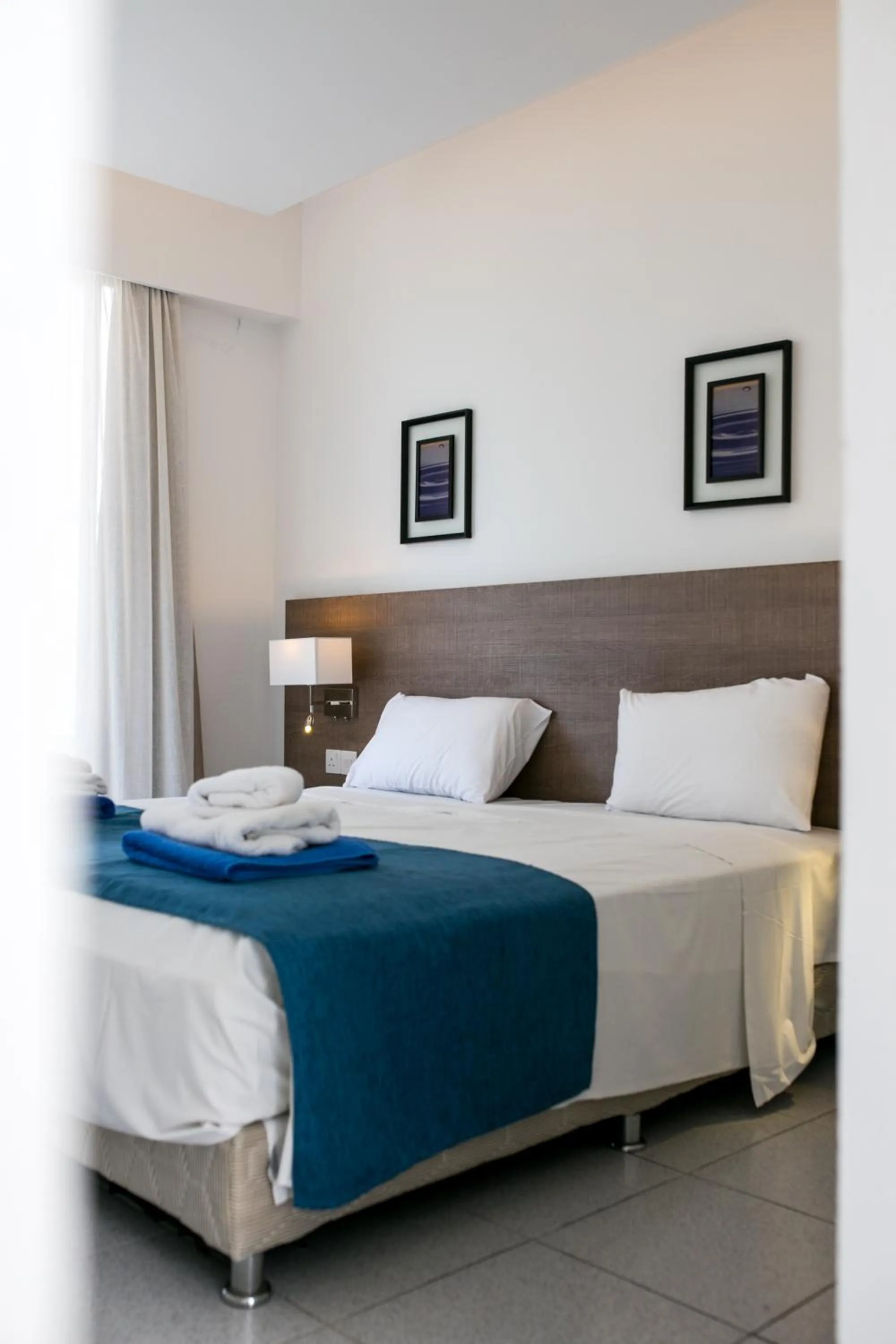 Bed in Marica's Boutique Hotel