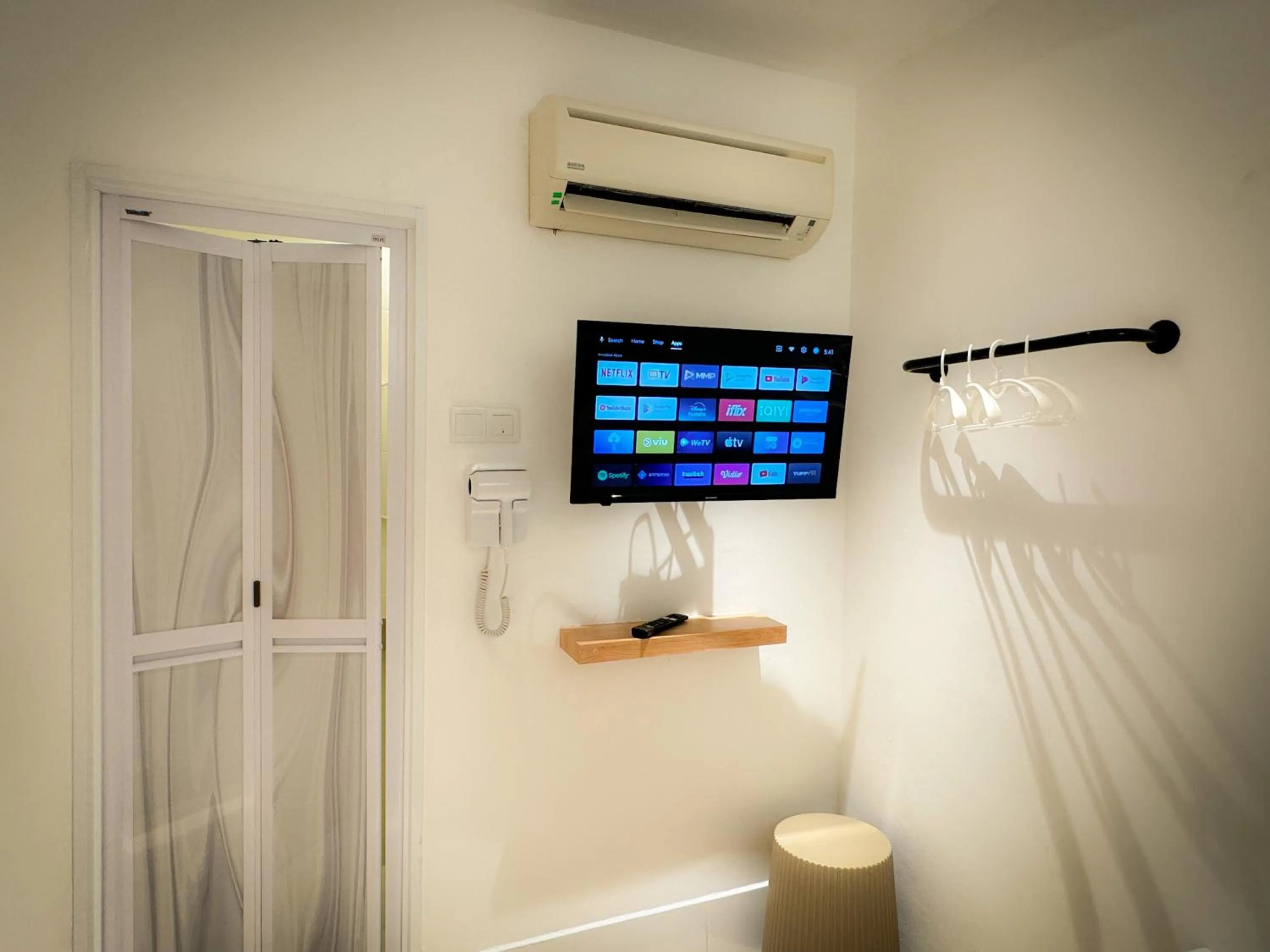 Bedroom in Apple 1 Hotel Queensbay