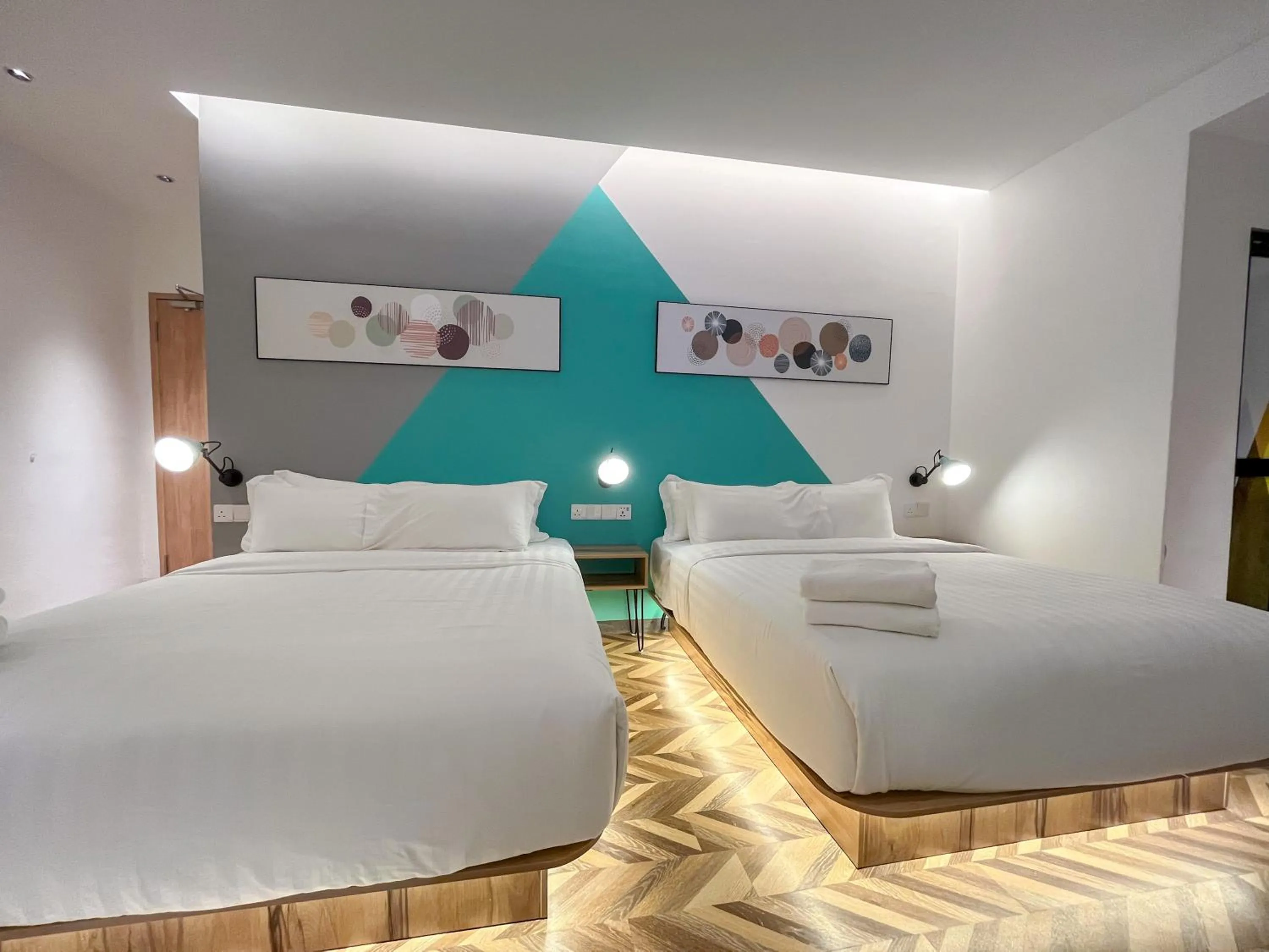 Bed in Apple 1 Hotel Queensbay