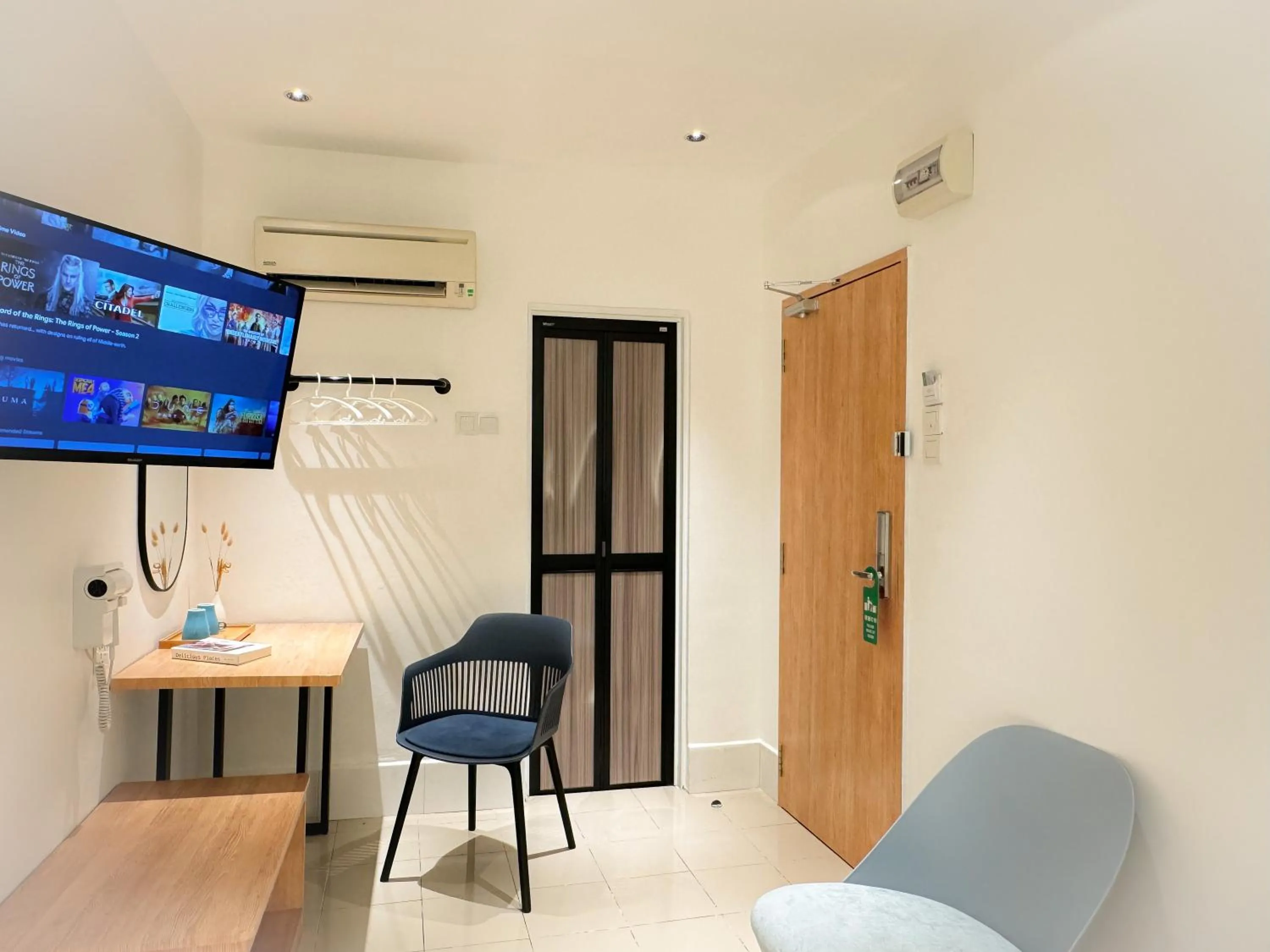 Bedroom in Apple 1 Hotel Queensbay