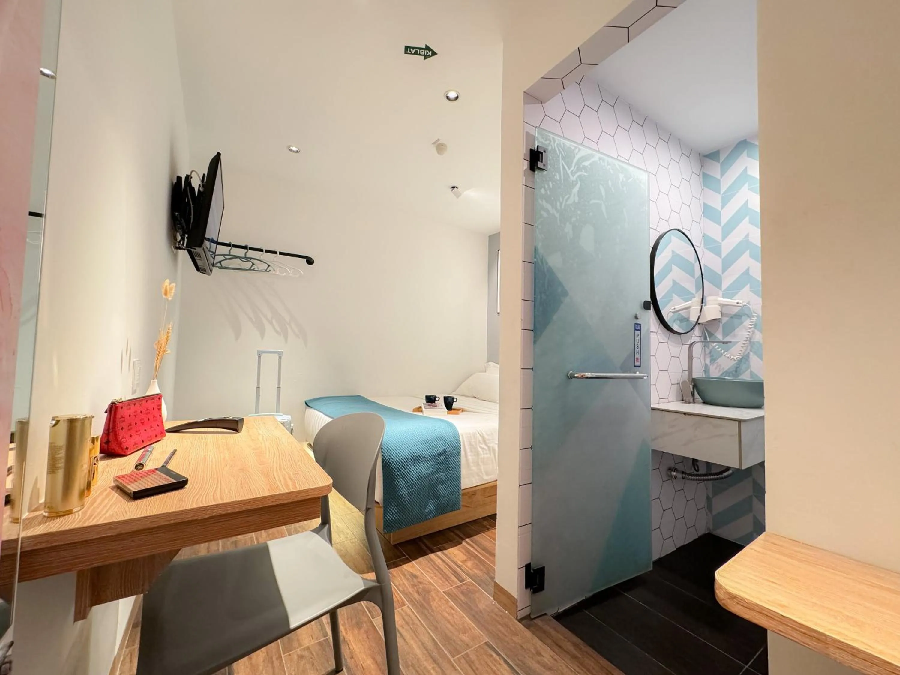 Bedroom in Apple 1 Hotel Queensbay