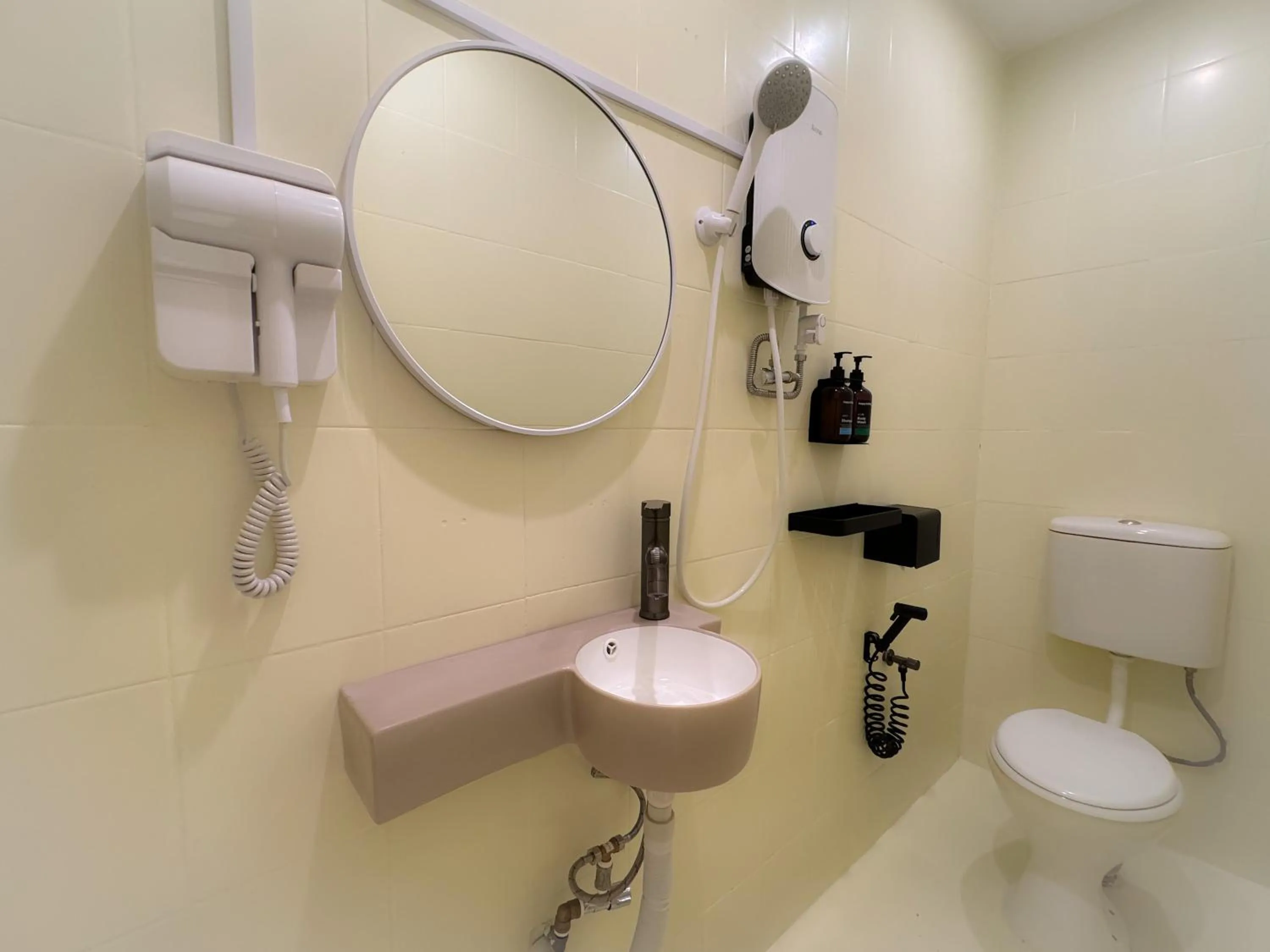 Bathroom in Apple 1 Hotel Queensbay