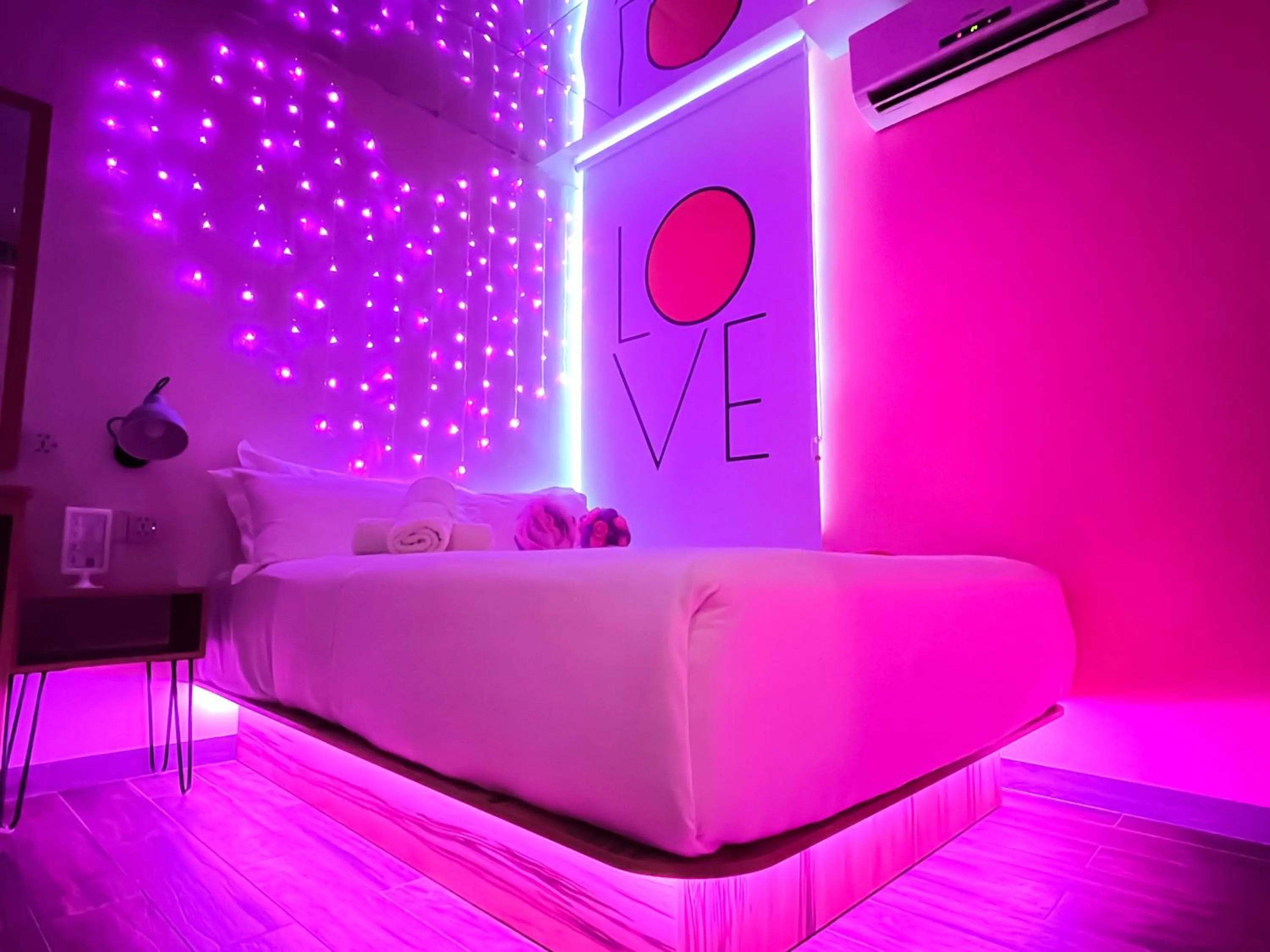 Bed in Apple 1 Hotel Queensbay