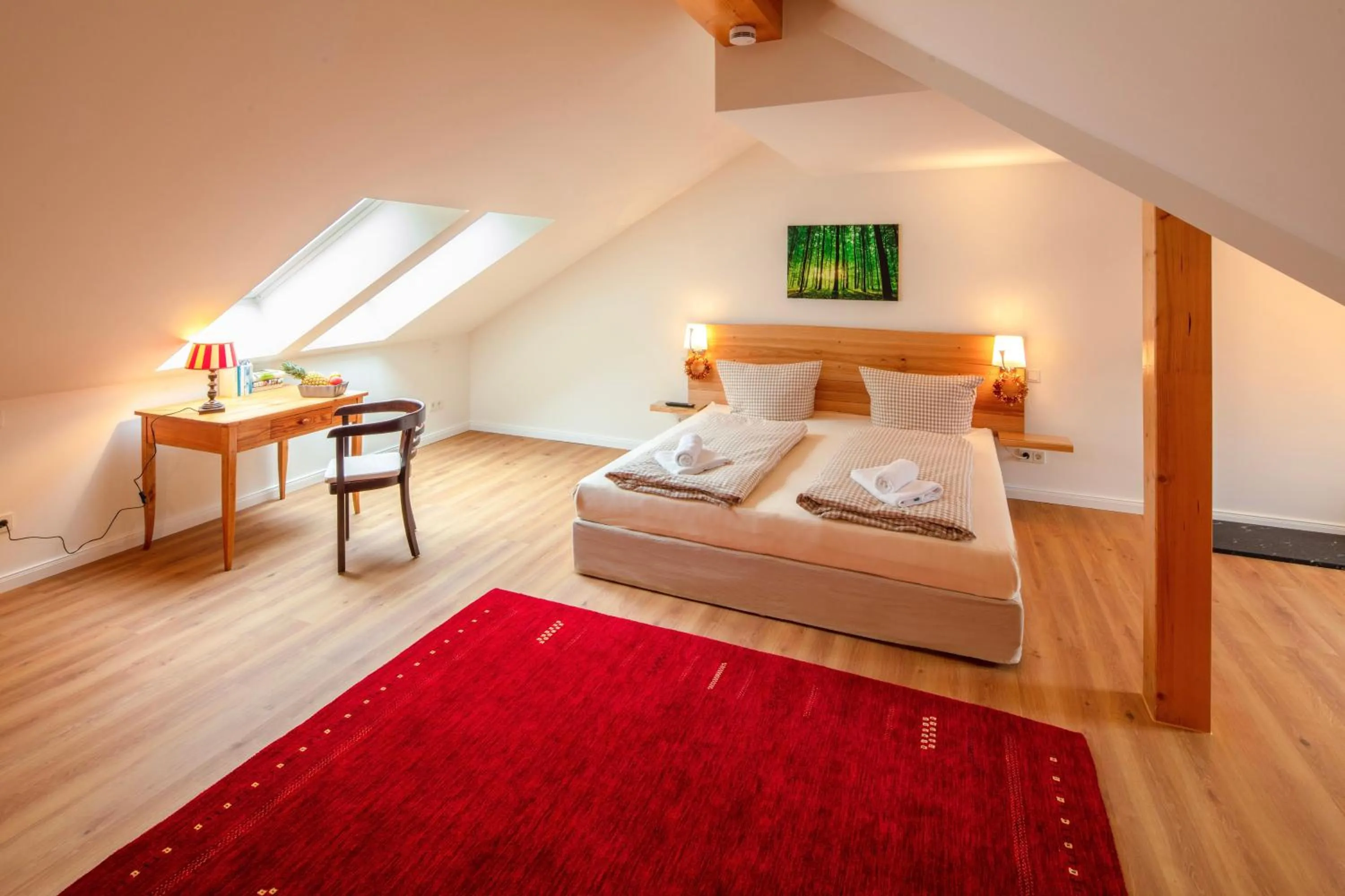 Seating area, Bed in Plumbohms ECHT-HARZ-HOTEL