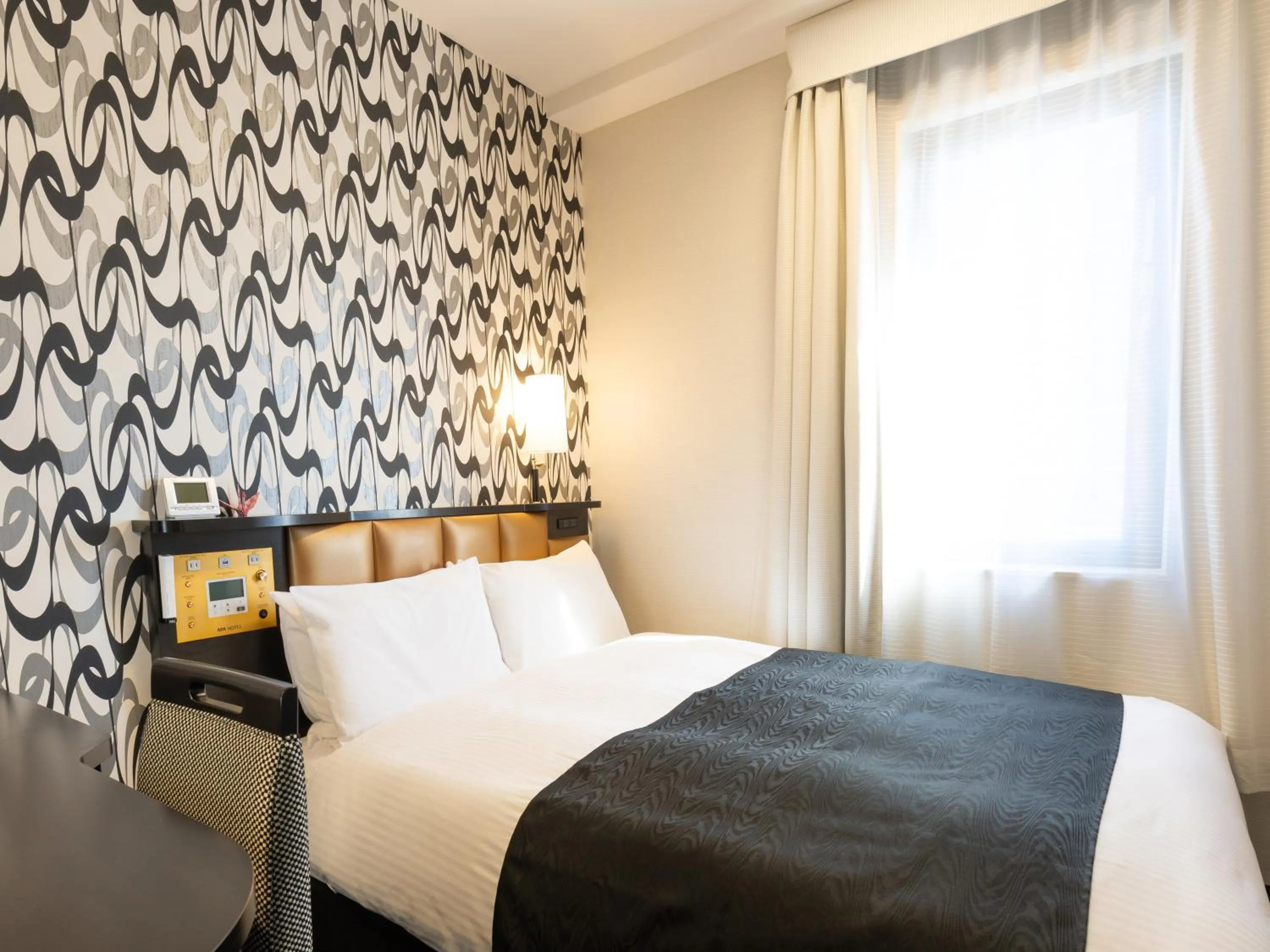 Photo of the whole room, Bed in APA Hotel STAY Toyama