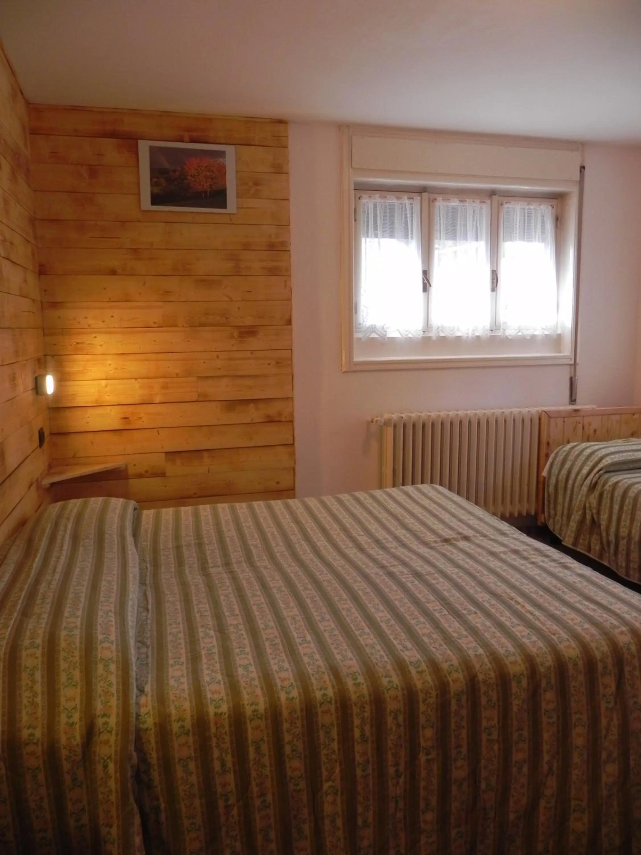 Bed in Albergo Cioccarelli