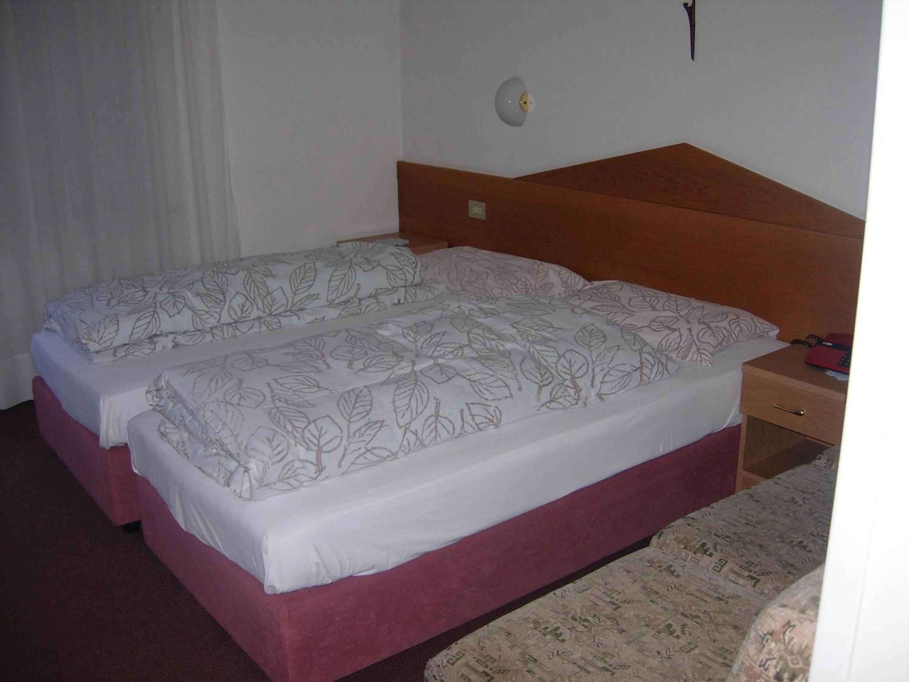 Bed in Hotel Albe
