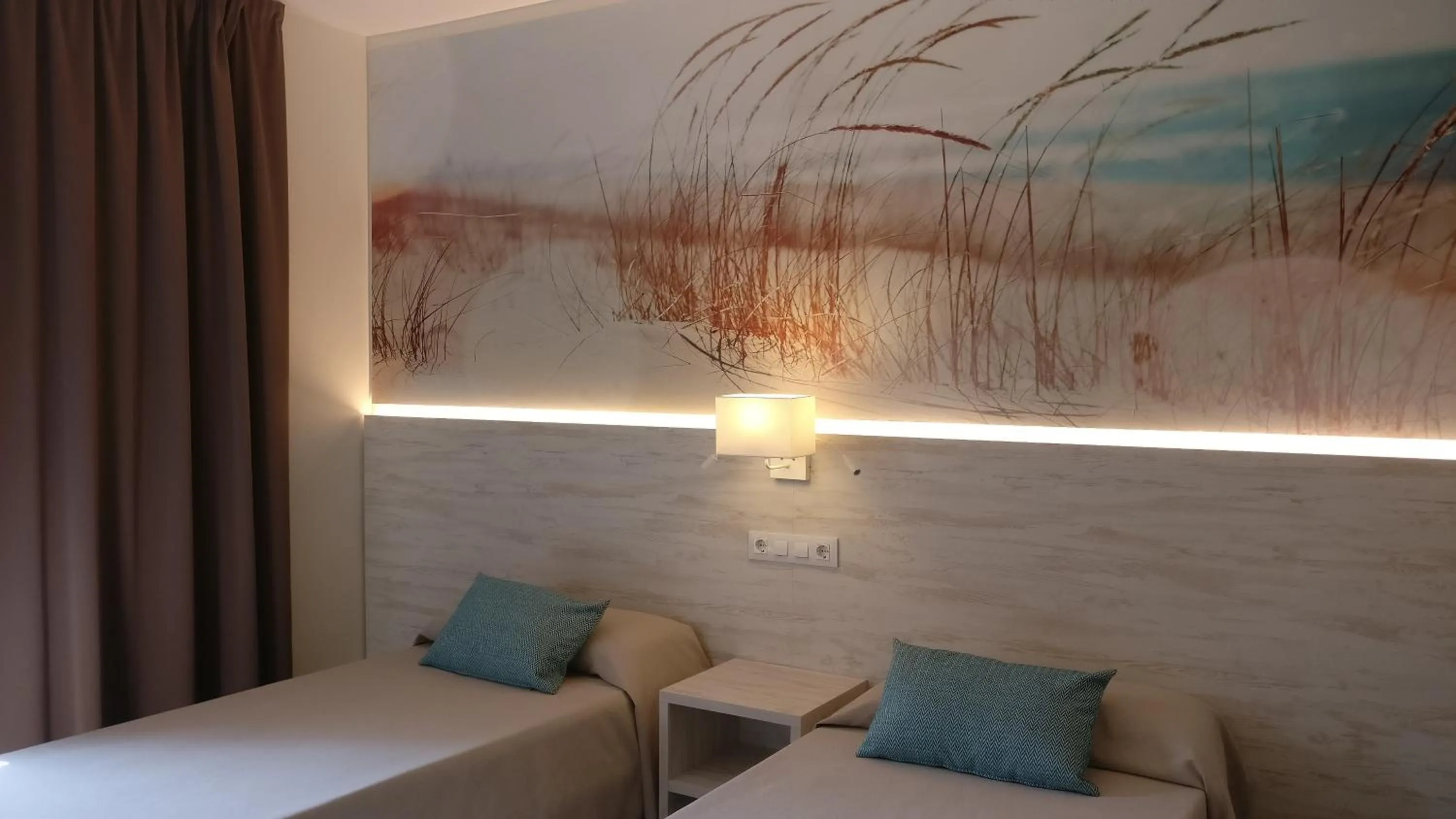 Bed in Aparthotel Las Mariposas