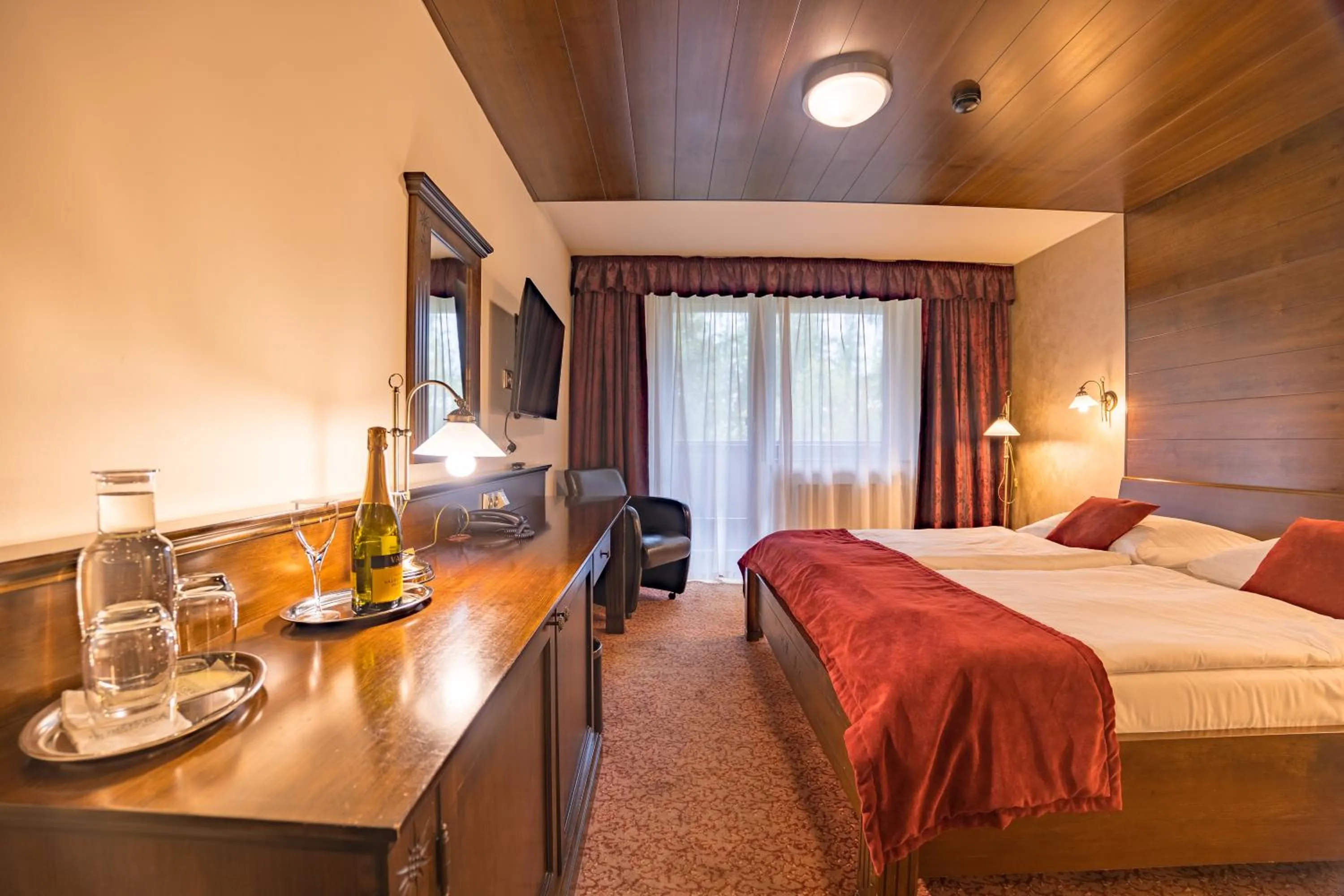 Photo of the whole room, Bed in APLEND Wellness Hotel Borovica