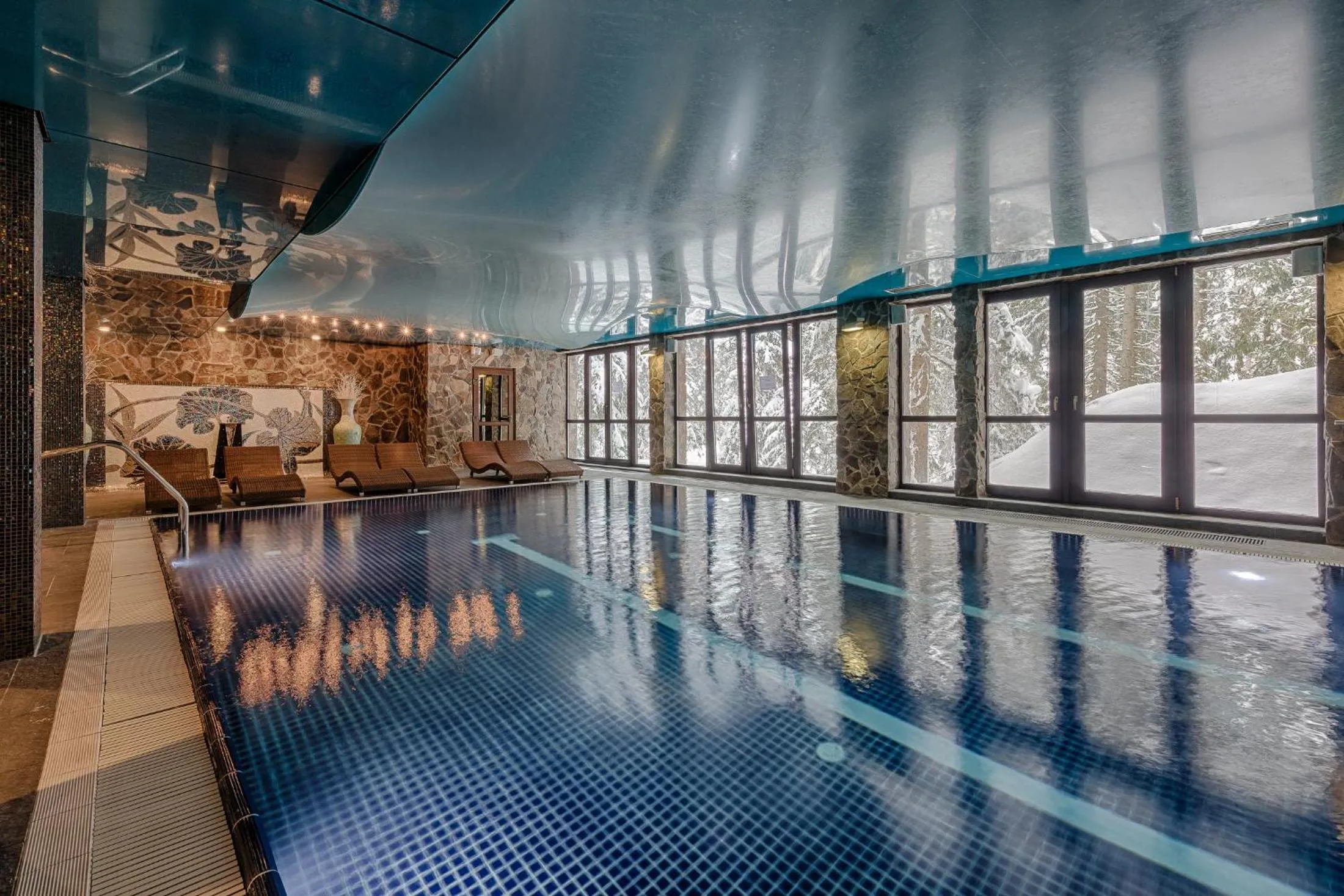 Swimming pool in APLEND Wellness Hotel Borovica