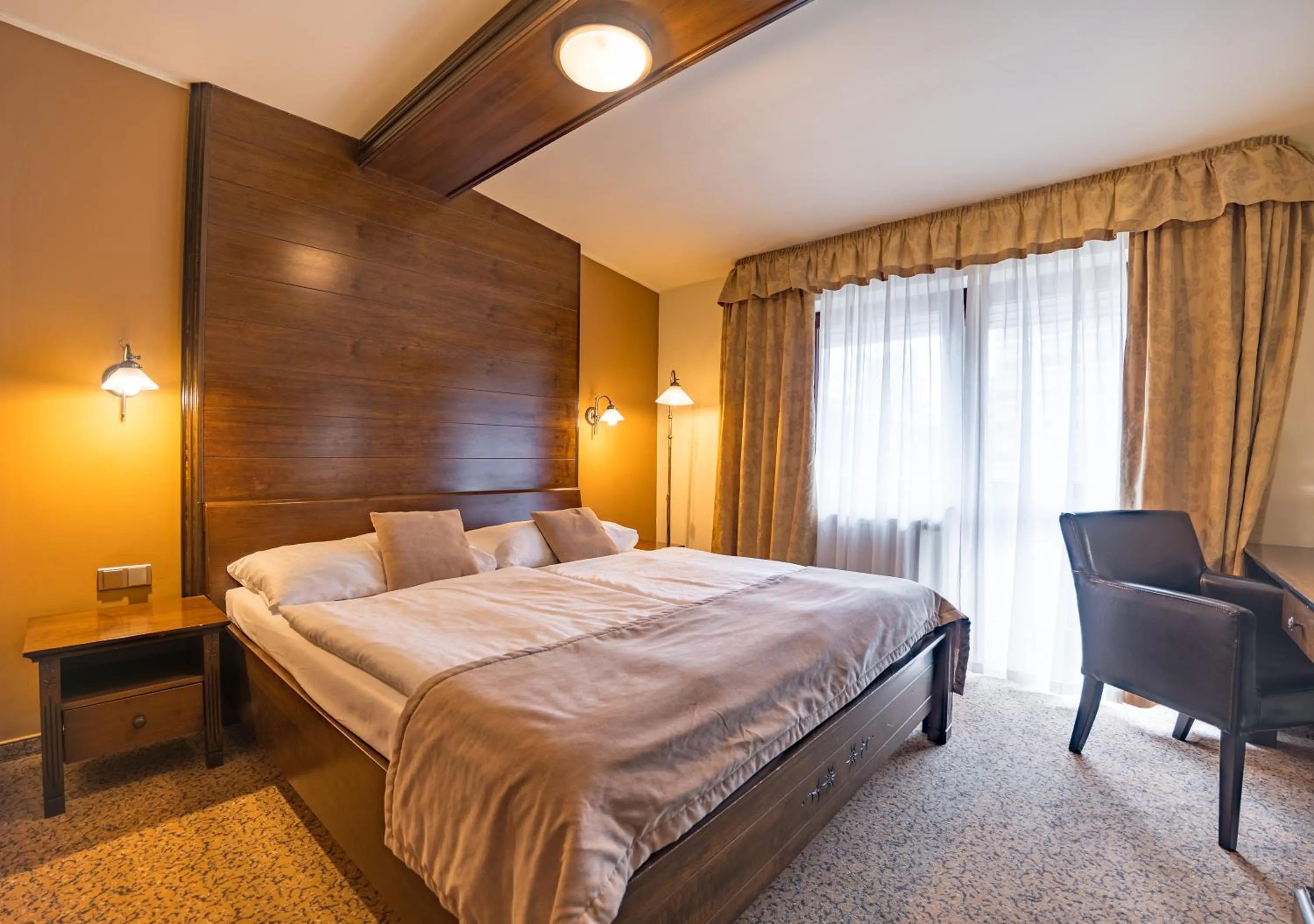 Photo of the whole room, Bed in APLEND Wellness Hotel Borovica