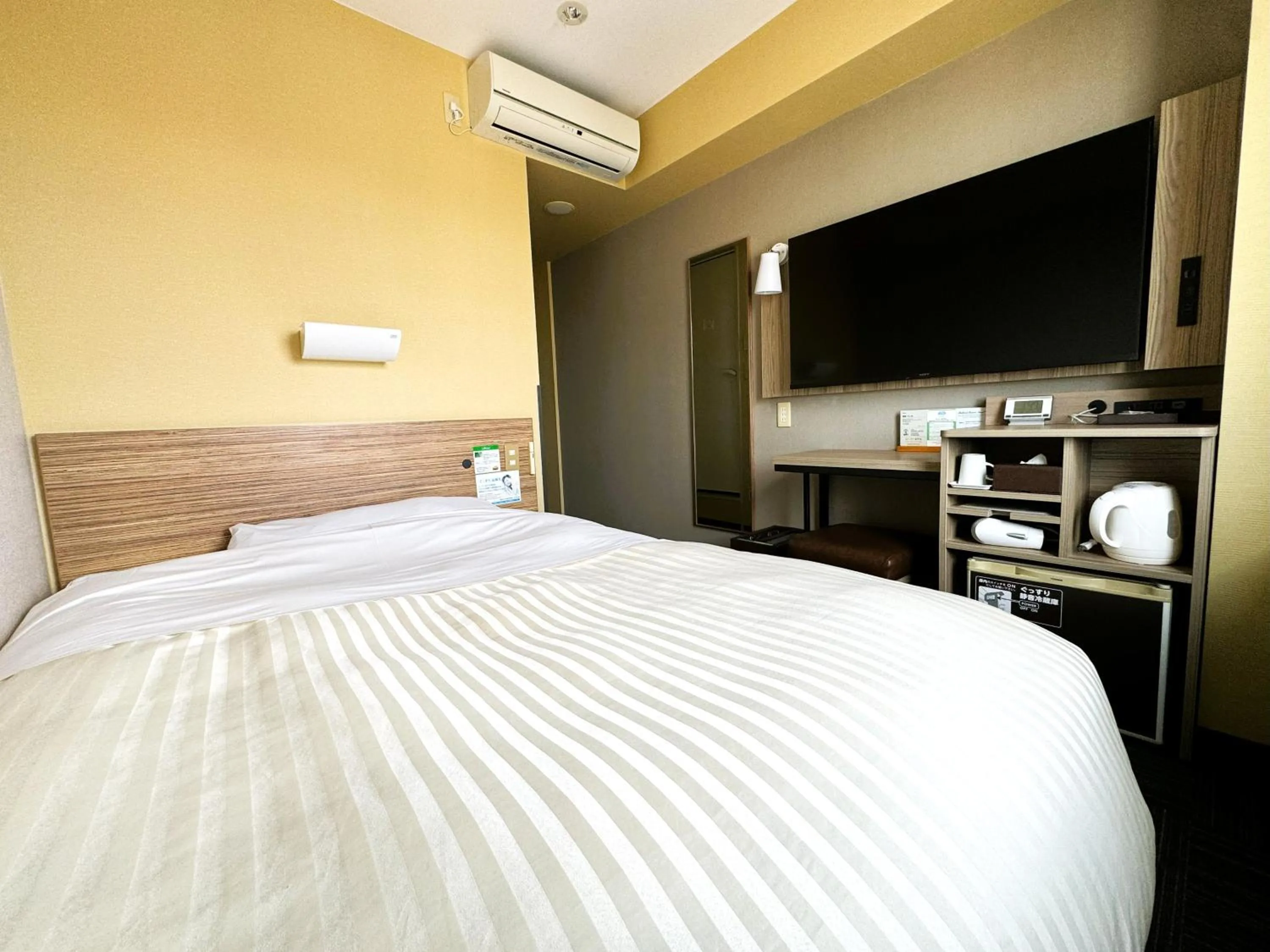 Bed in Super Hotel Hirosaki