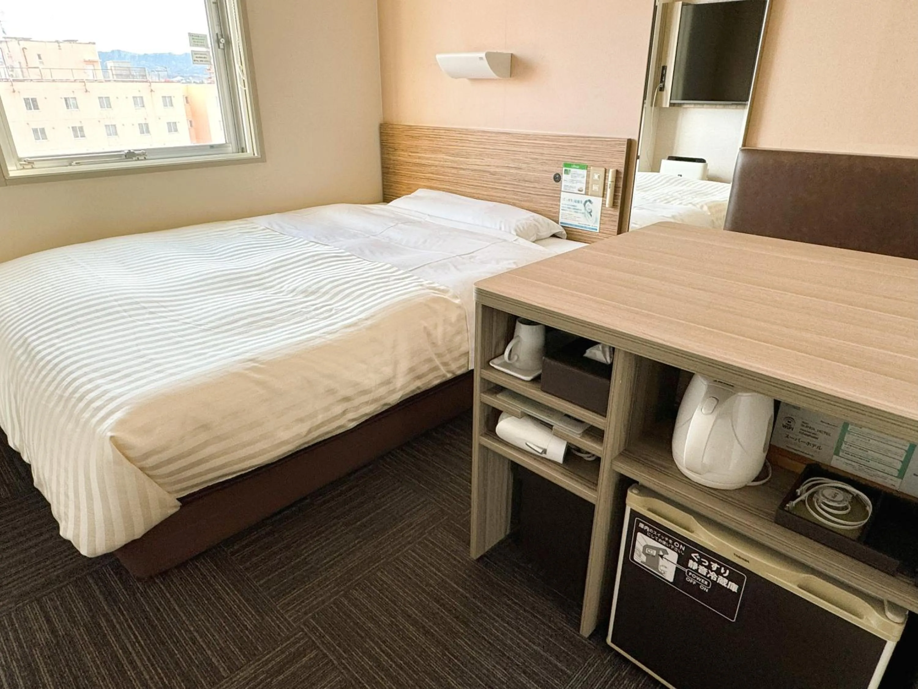 Bed in Super Hotel Hirosaki