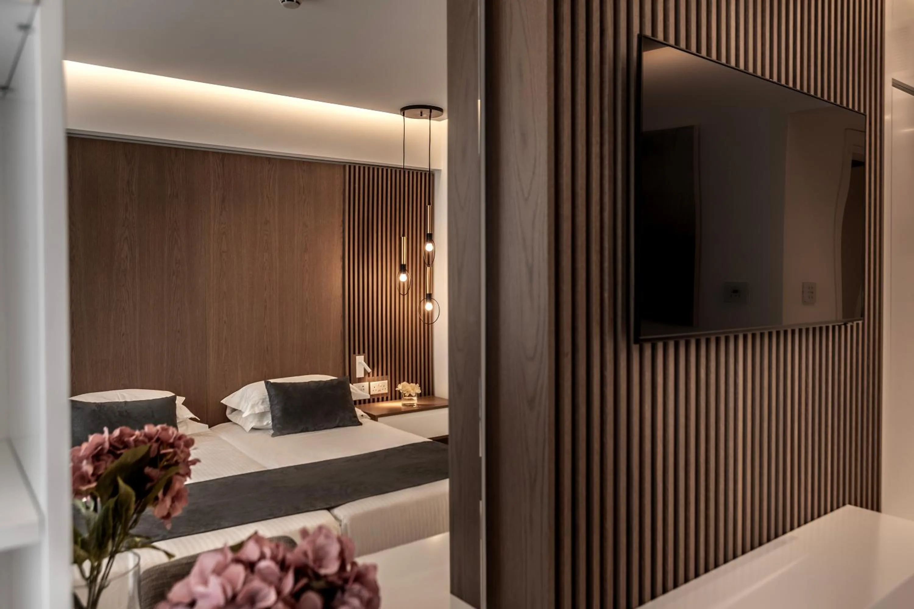 Communal lounge/ TV room, Bed in Pavlo Napa Beach Hotel