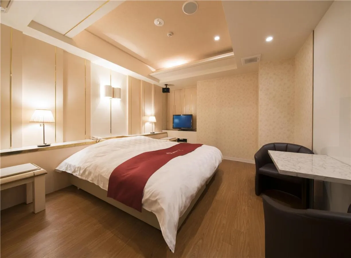 Bed in Prime Hotel Fulula プライムホテル フルーラ