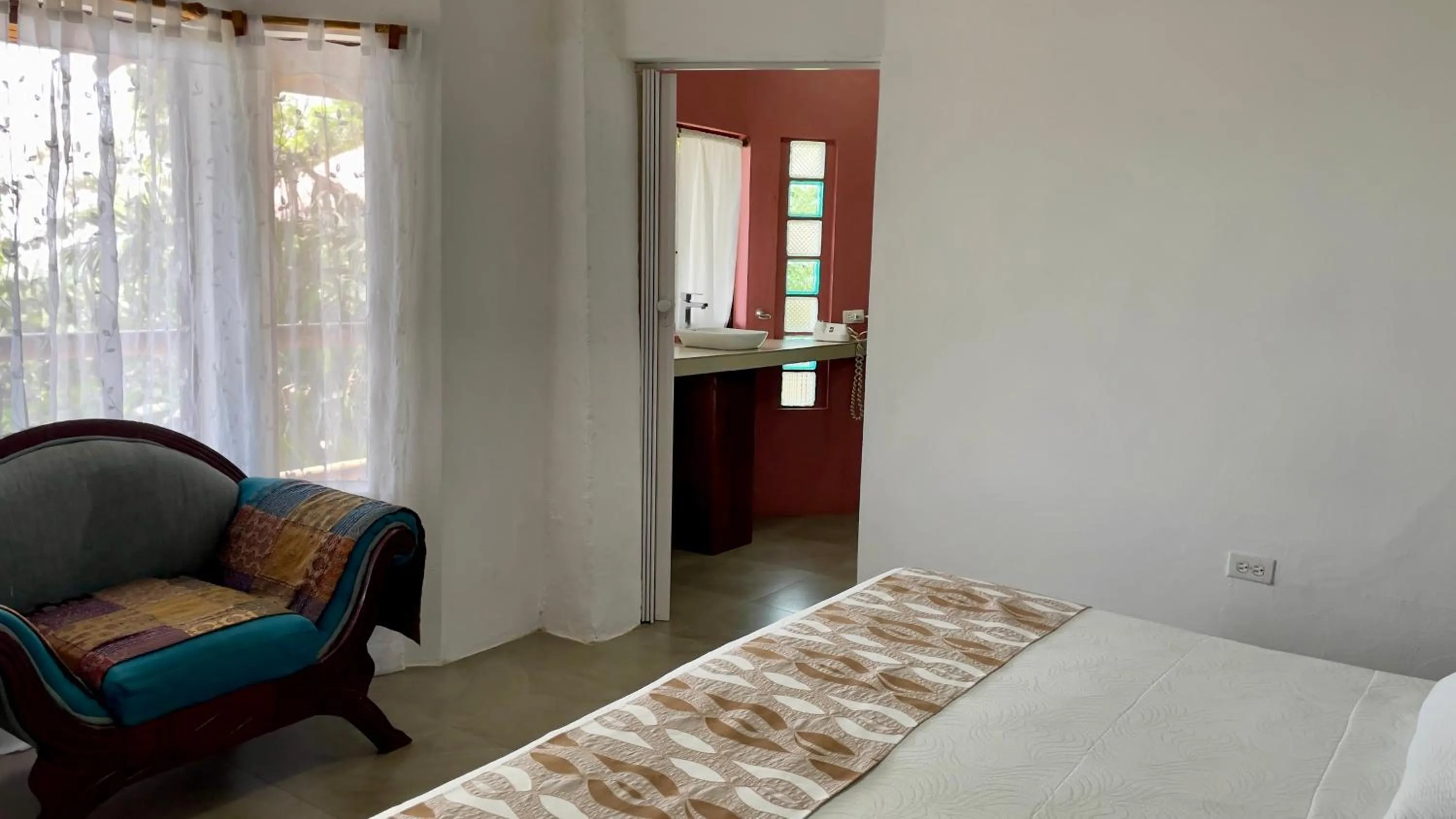 Bed in Samai Lodge Holistic Living