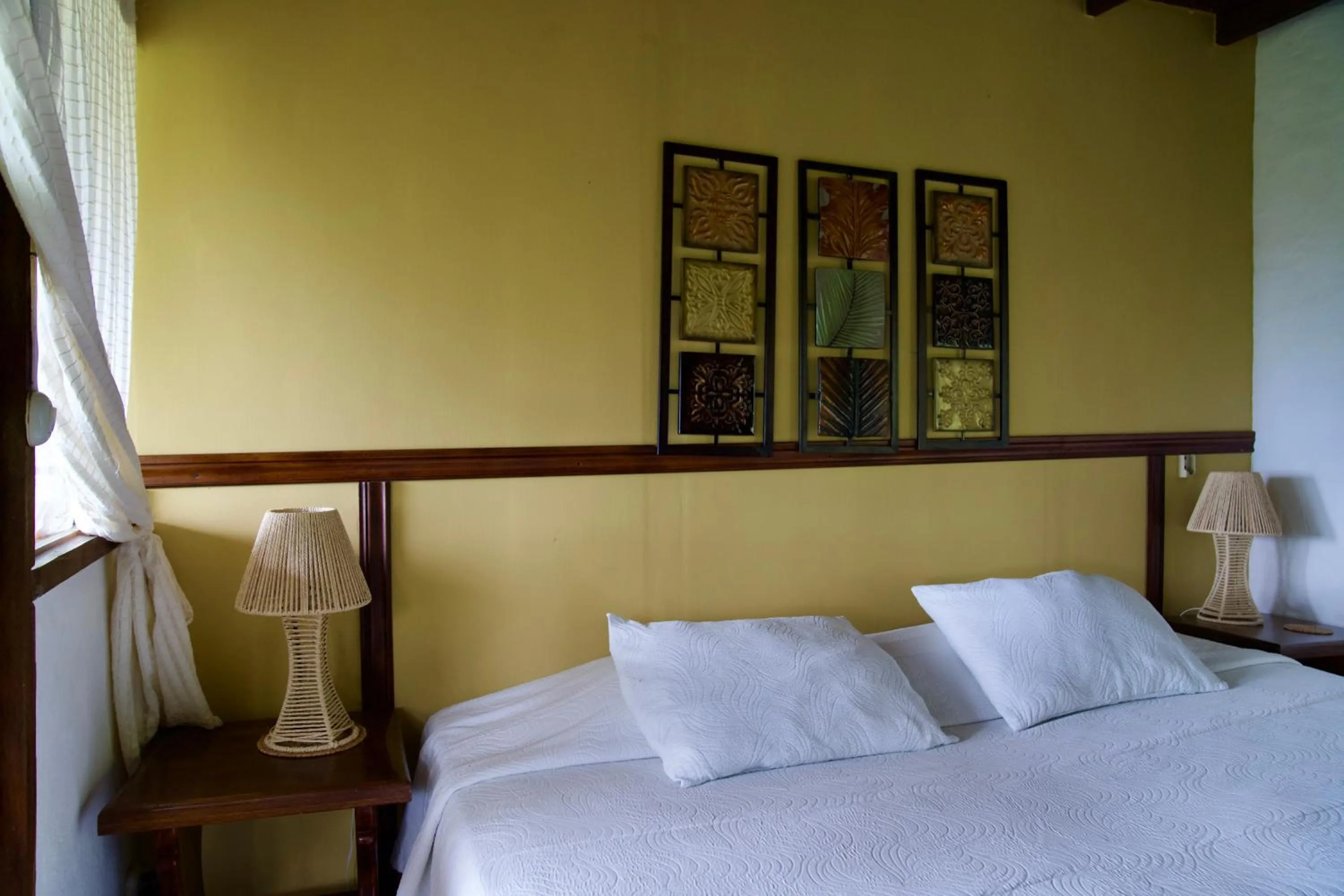 Bed in Samai Lodge Holistic Living
