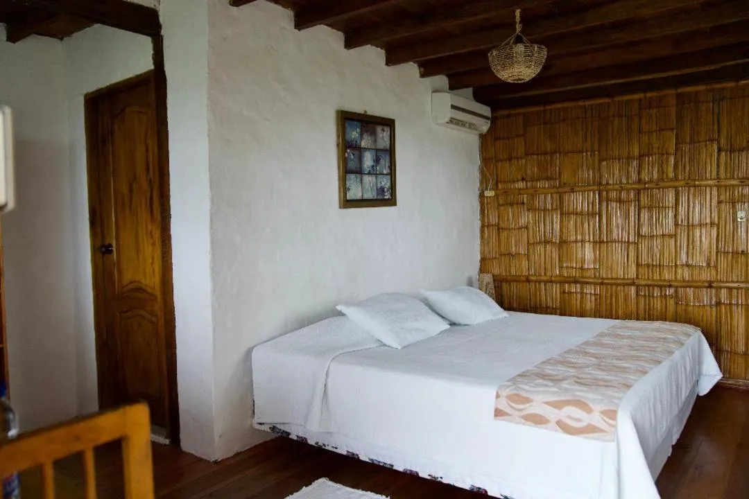 Bed in Samai Lodge Holistic Living