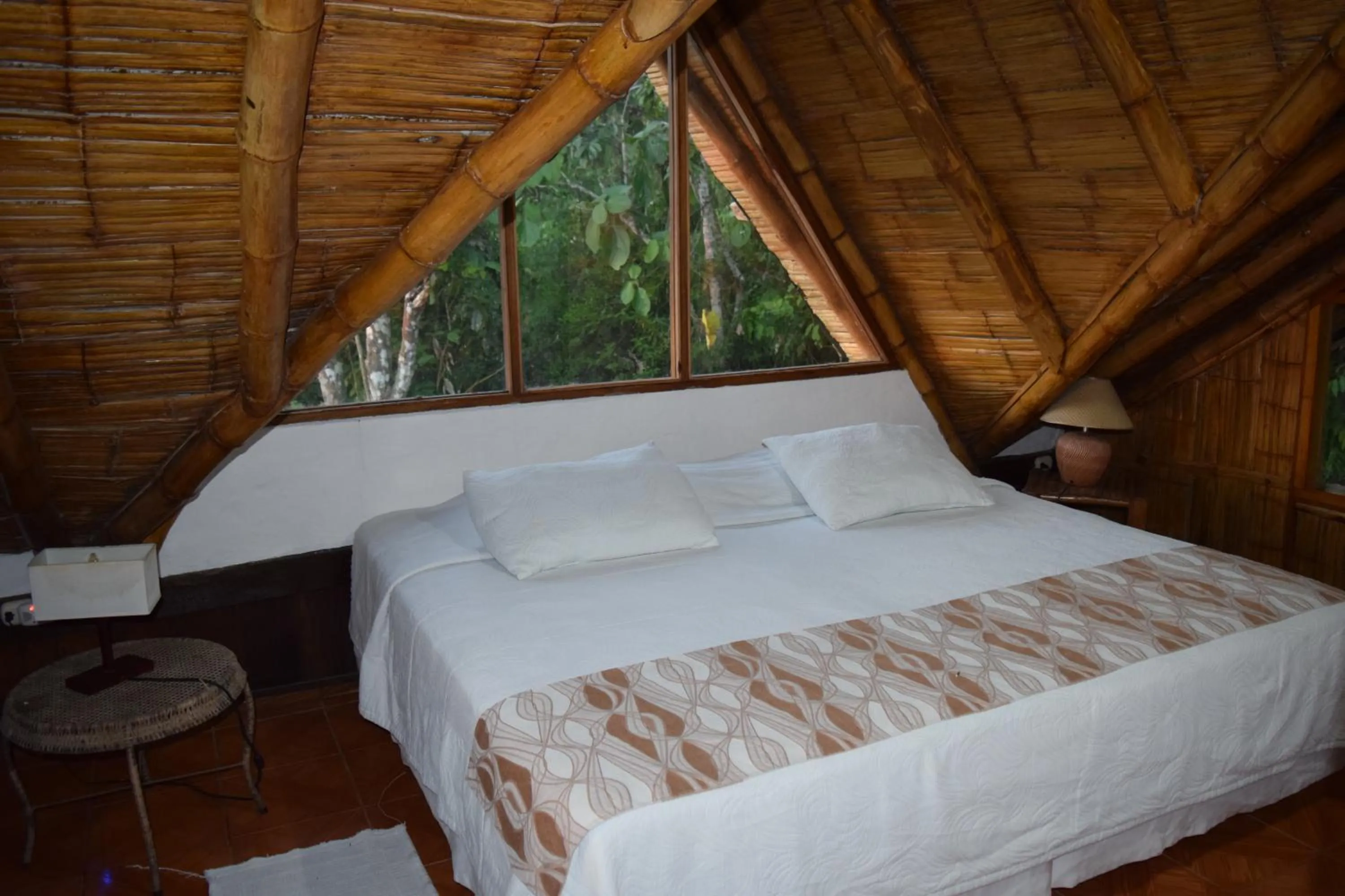 Bed in Samai Lodge Holistic Living