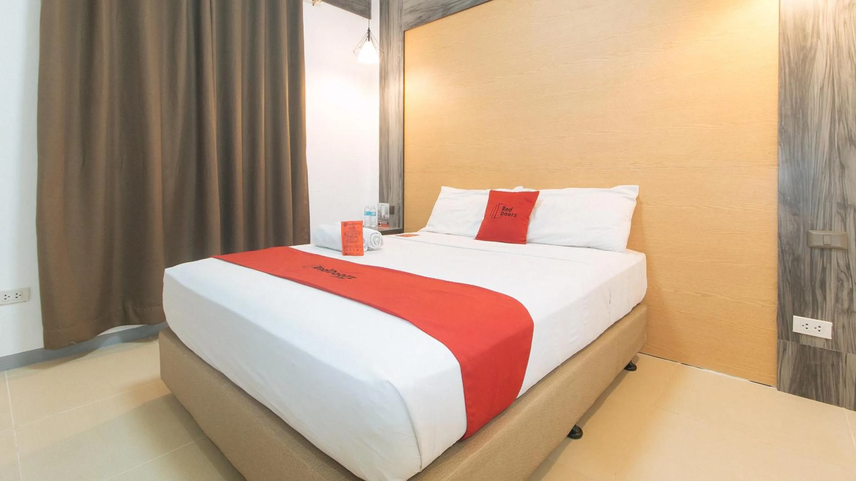 Bed in RedDoorz Plus at EDSA Congressional