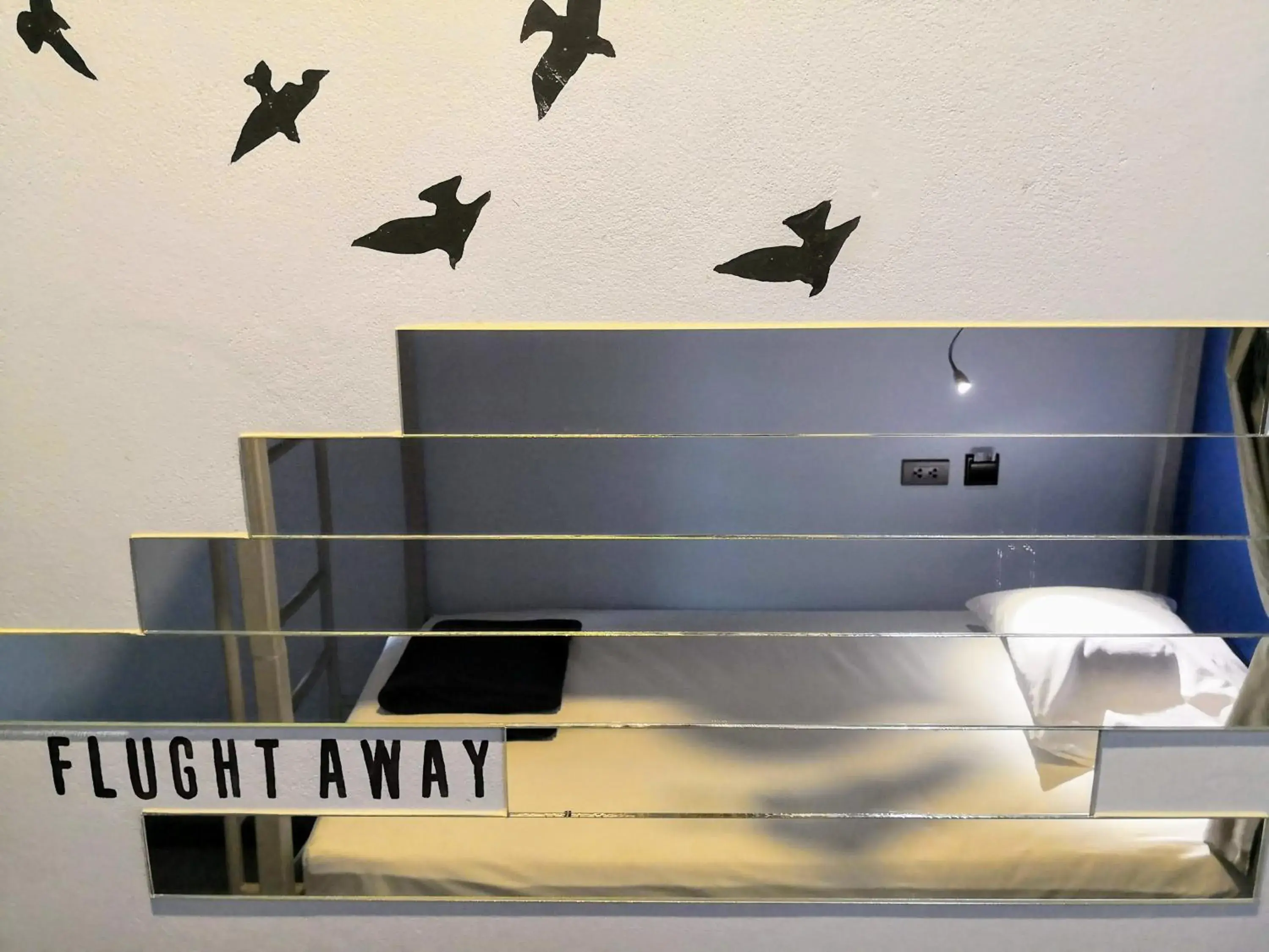 Bed in 4-Bed Male Dormitory Room in Asleep by Lantana Bed in 4-Bed Male Dormitory Room in Asleep by Lantana