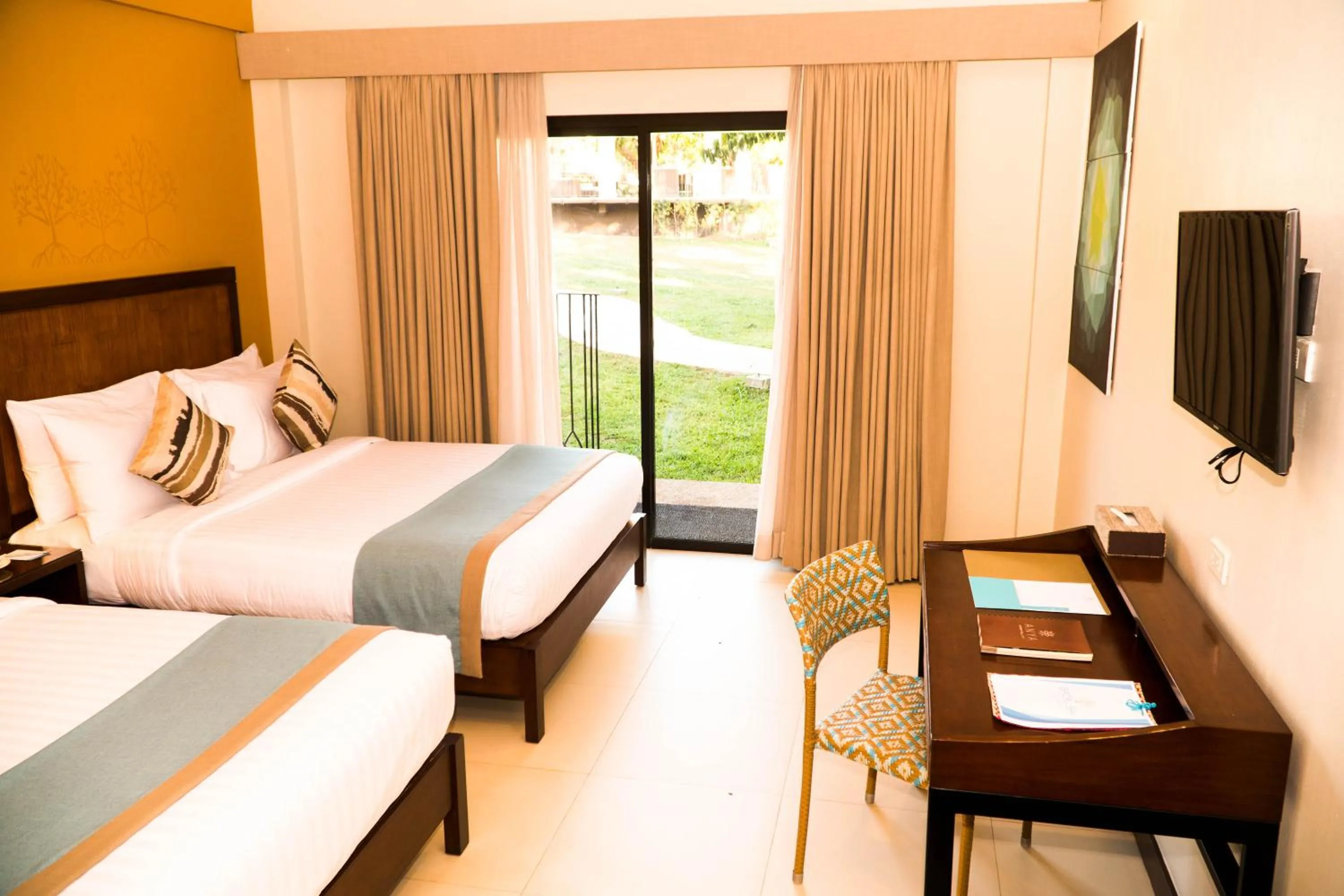 Garden view, Bed in Bacau Bay Resort Coron