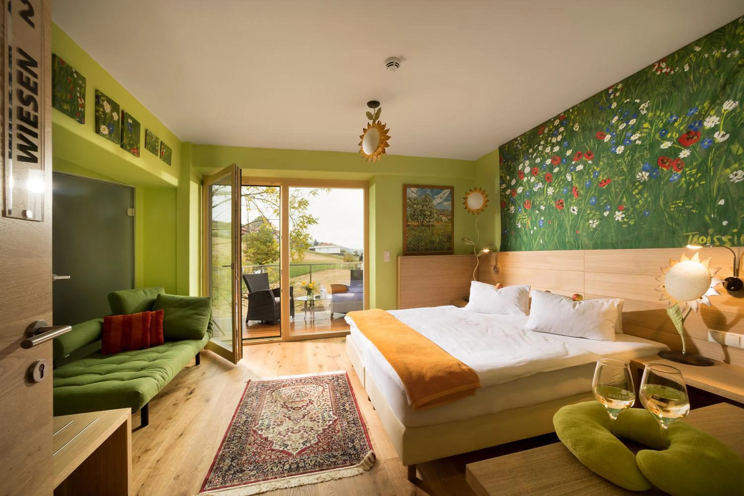 Photo of the whole room in Malerwinkl Restaurant + Kunsthotel