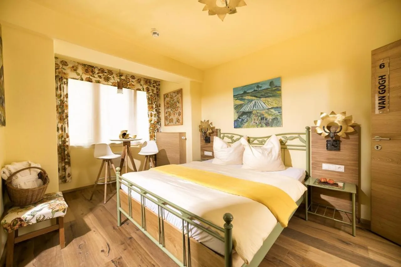 Photo of the whole room in Malerwinkl Restaurant + Kunsthotel