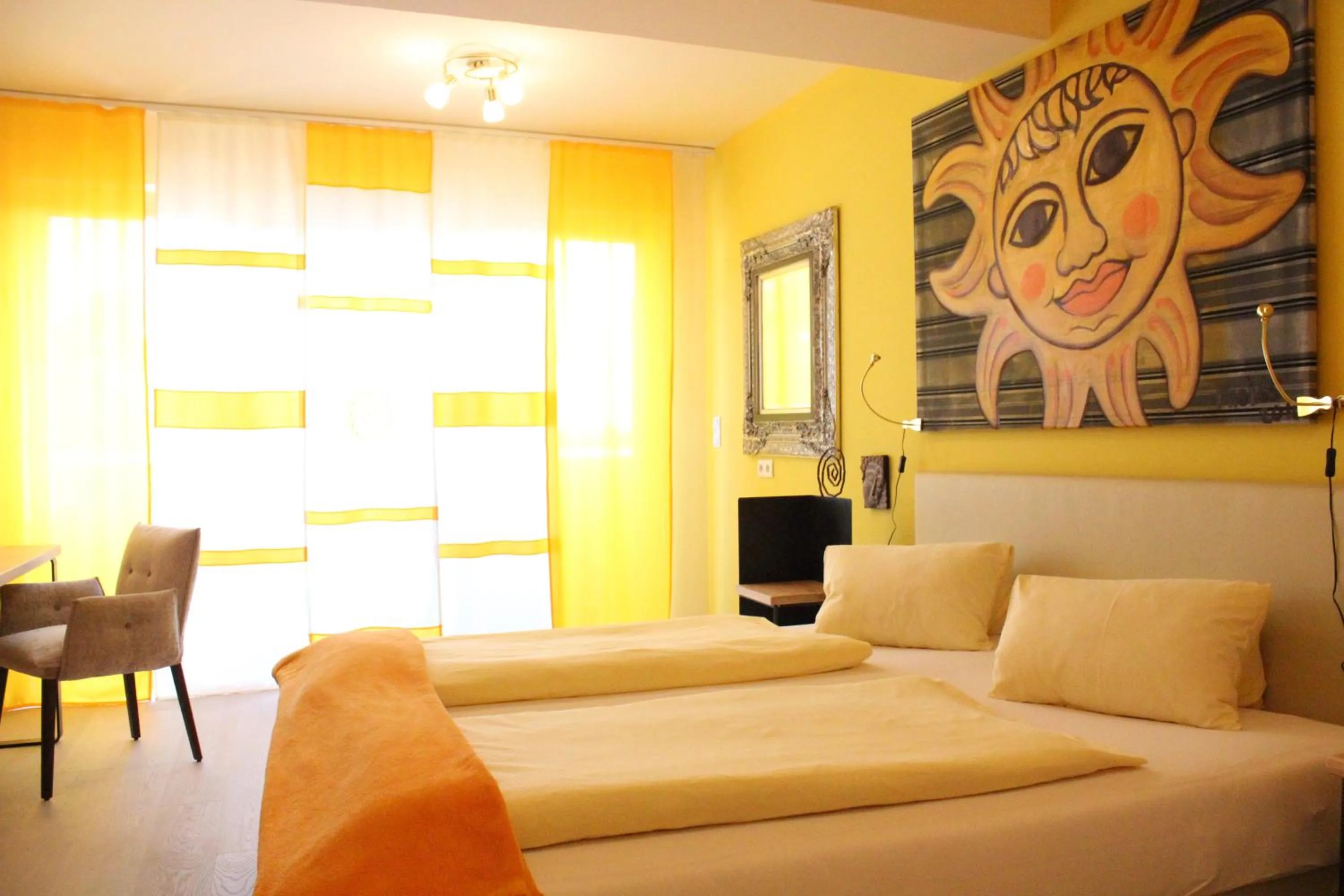 Photo of the whole room in Malerwinkl Restaurant + Kunsthotel